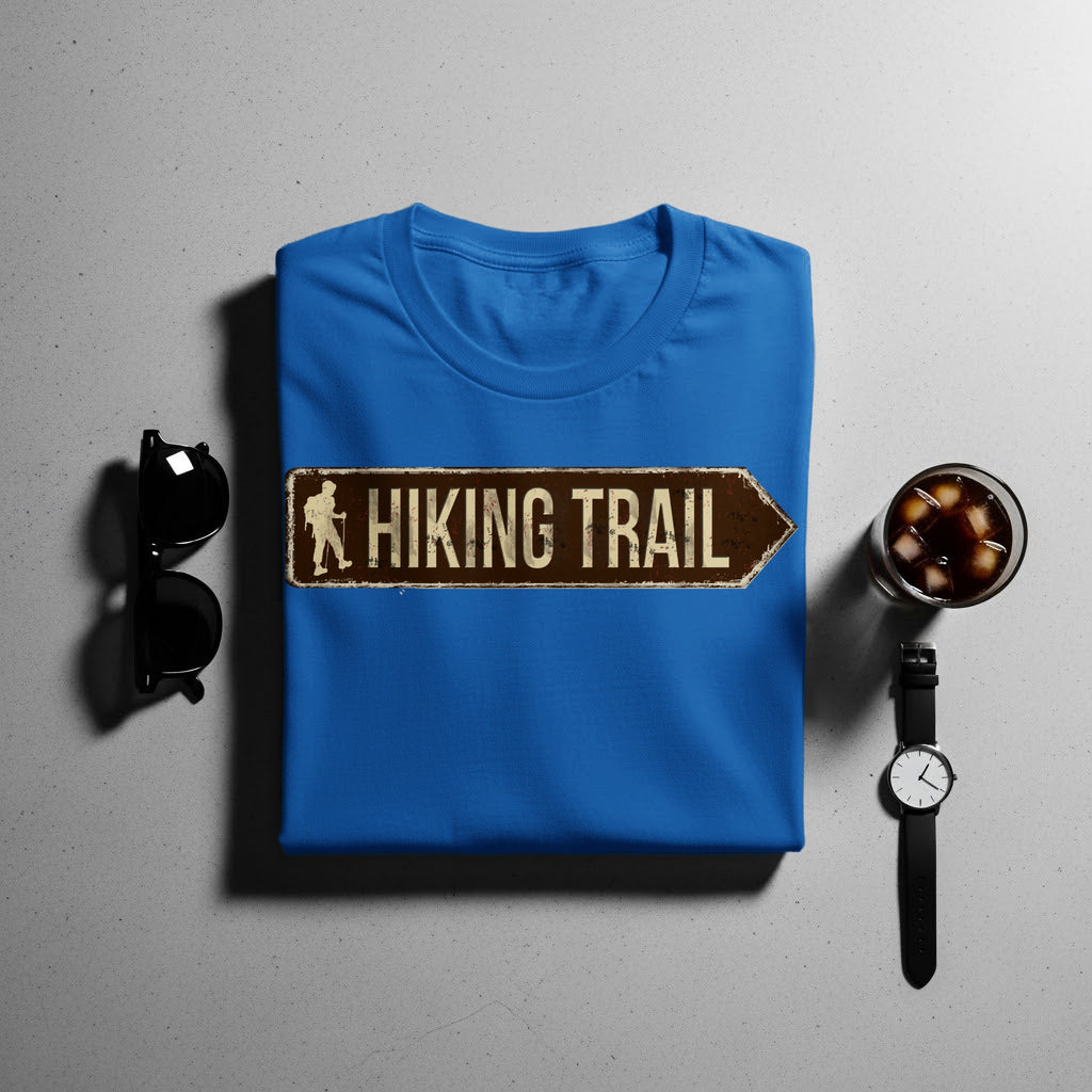 Blue t-shirt with a distressed brown "Hiking Trail" sign graphic.
