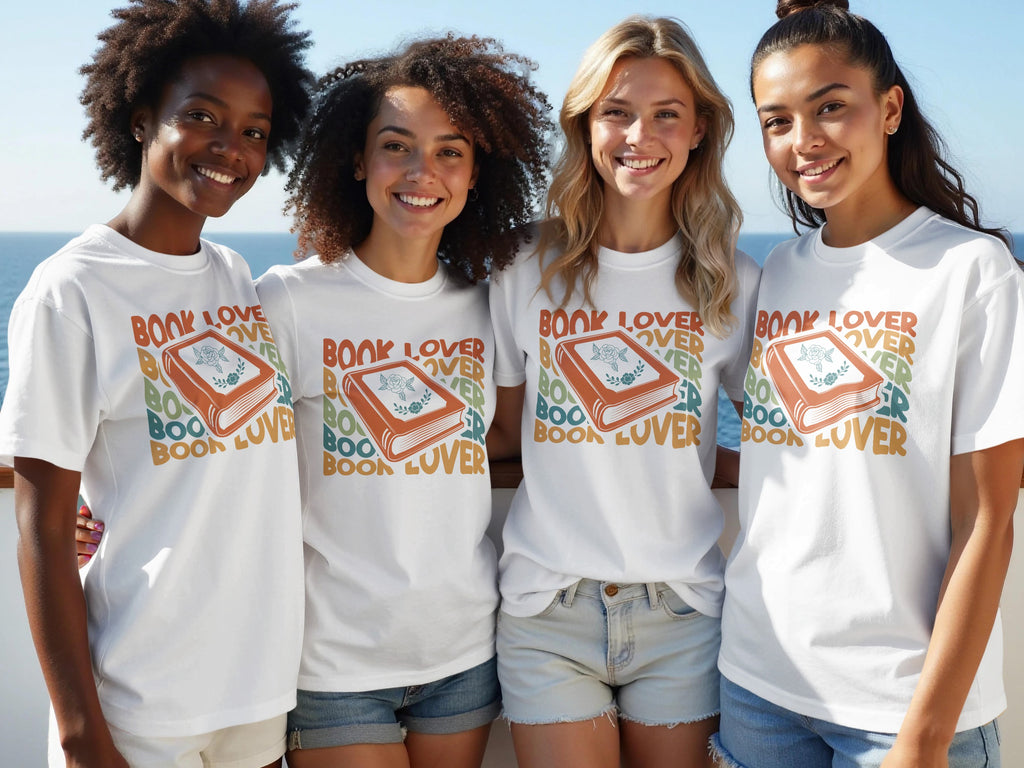 Four women model white t-shirts with "Book Lover" text and an illustrated book graphic.