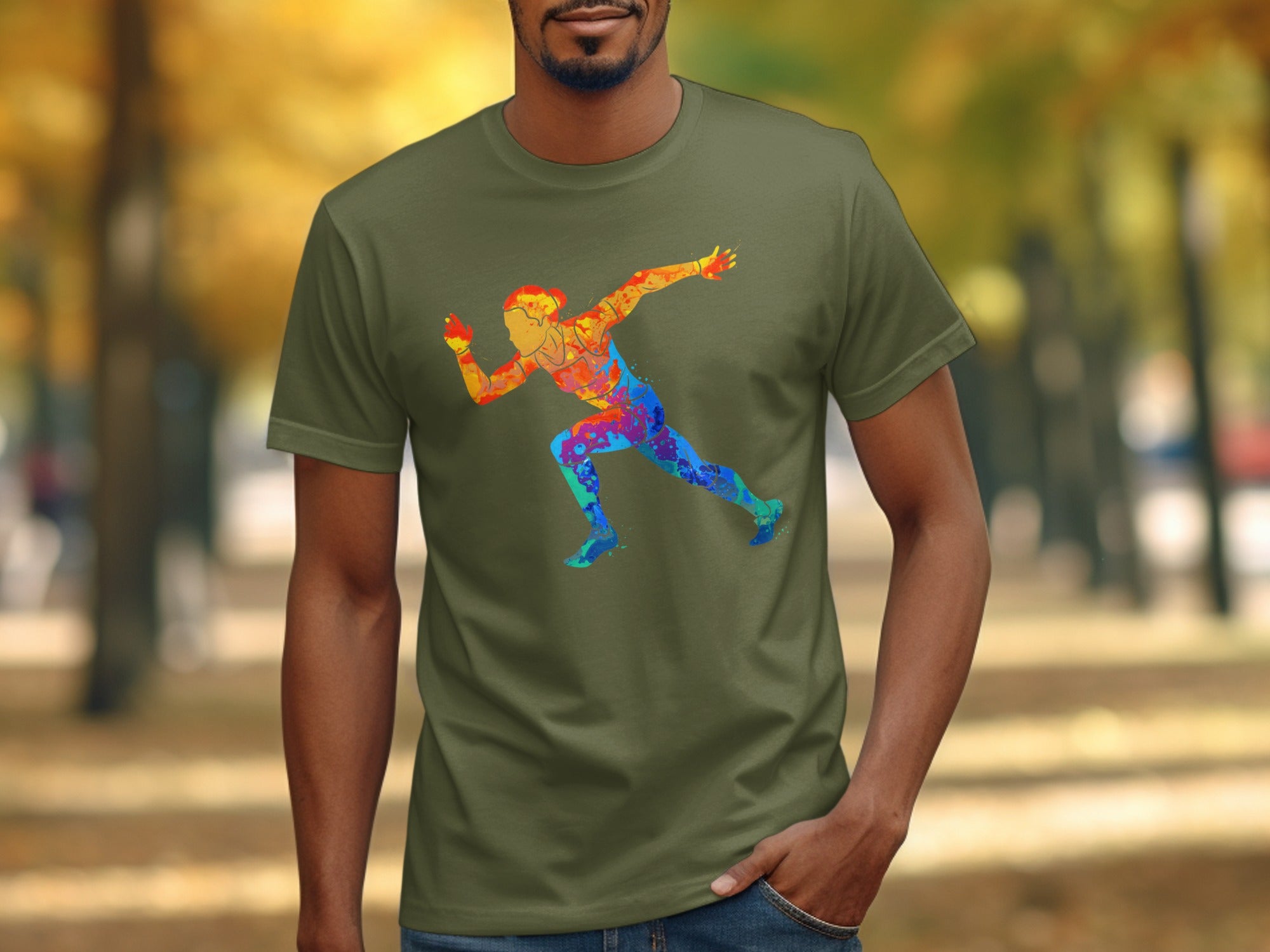 Green t-shirt with colorful abstract runner graphic on chest.