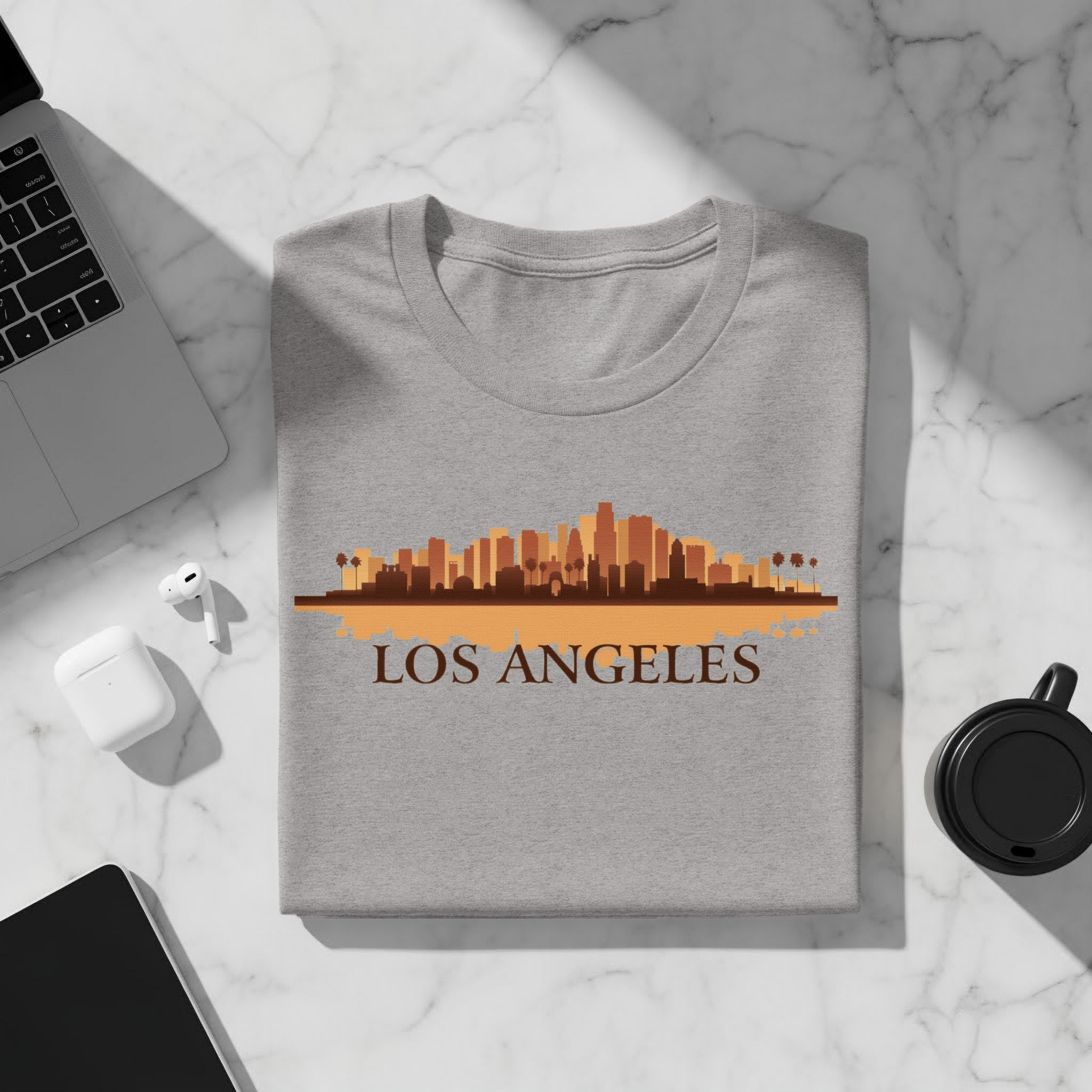Grey t-shirt with a Los Angeles skyline graphic and text.
