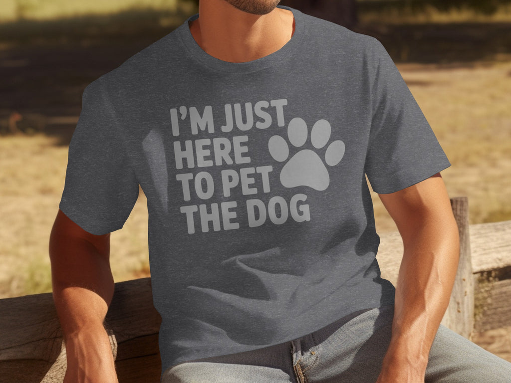 Dark grey t-shirt with white text "I'M JUST HERE TO PET THE DOG" and paw print.