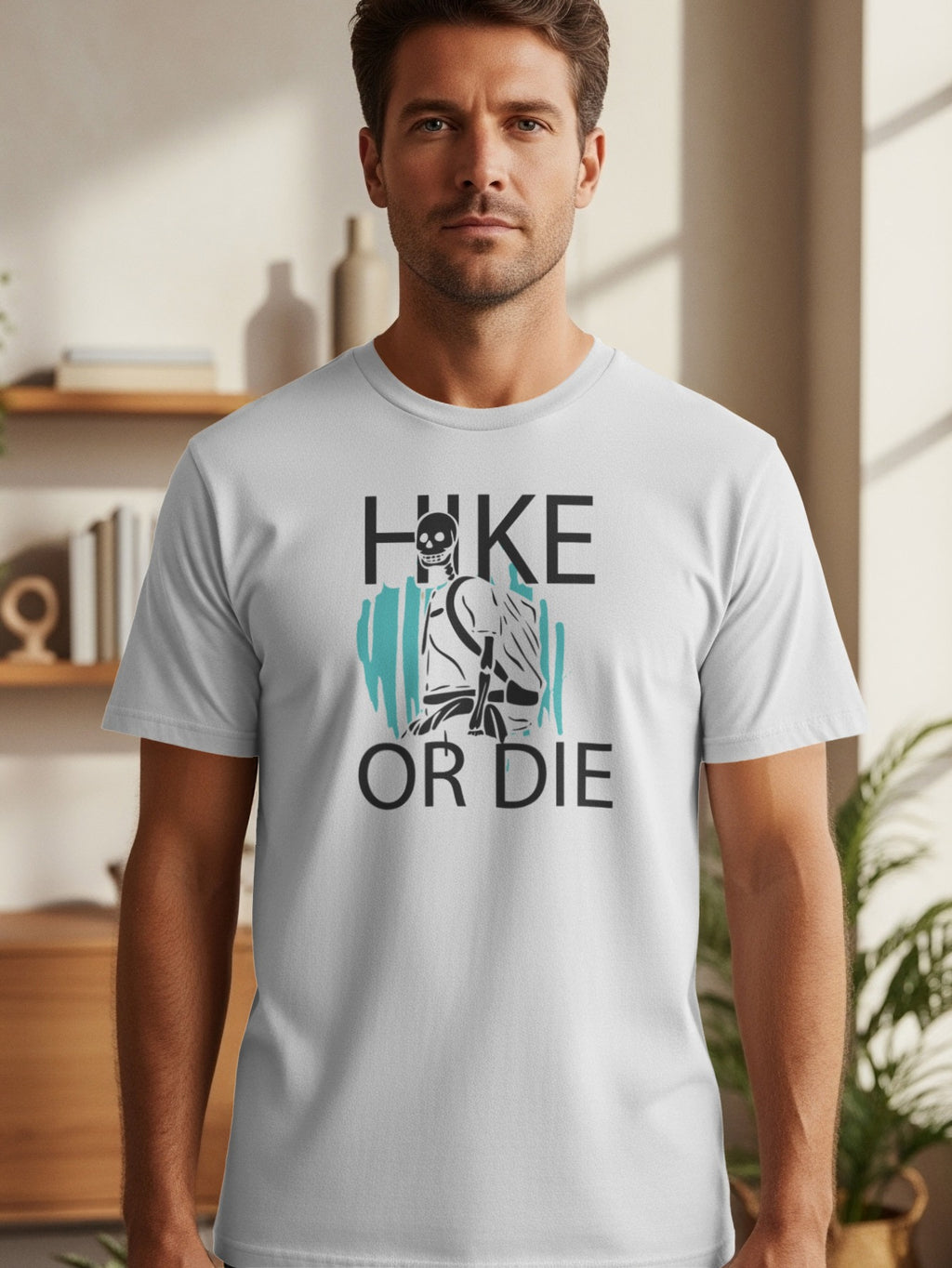 White t-shirt with "HIKE OR DIE" text and skeleton hiker graphic.