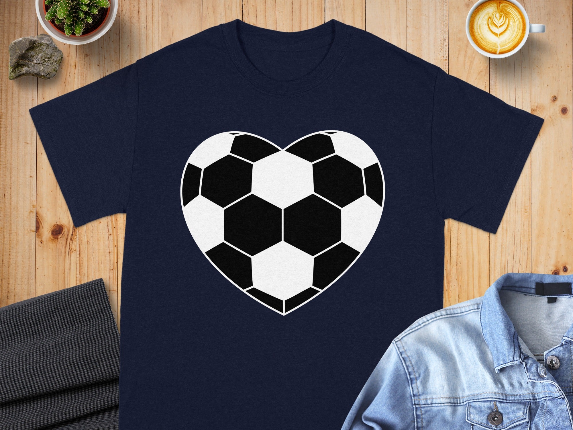 Navy t-shirt with a black and white soccer ball heart graphic.