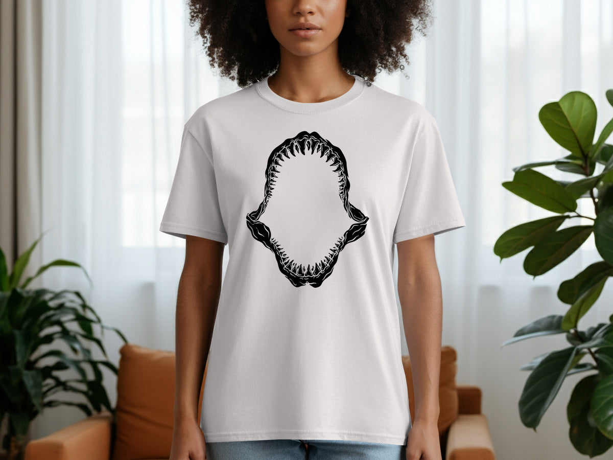 White t-shirt with black shark jaw graphic on the front.