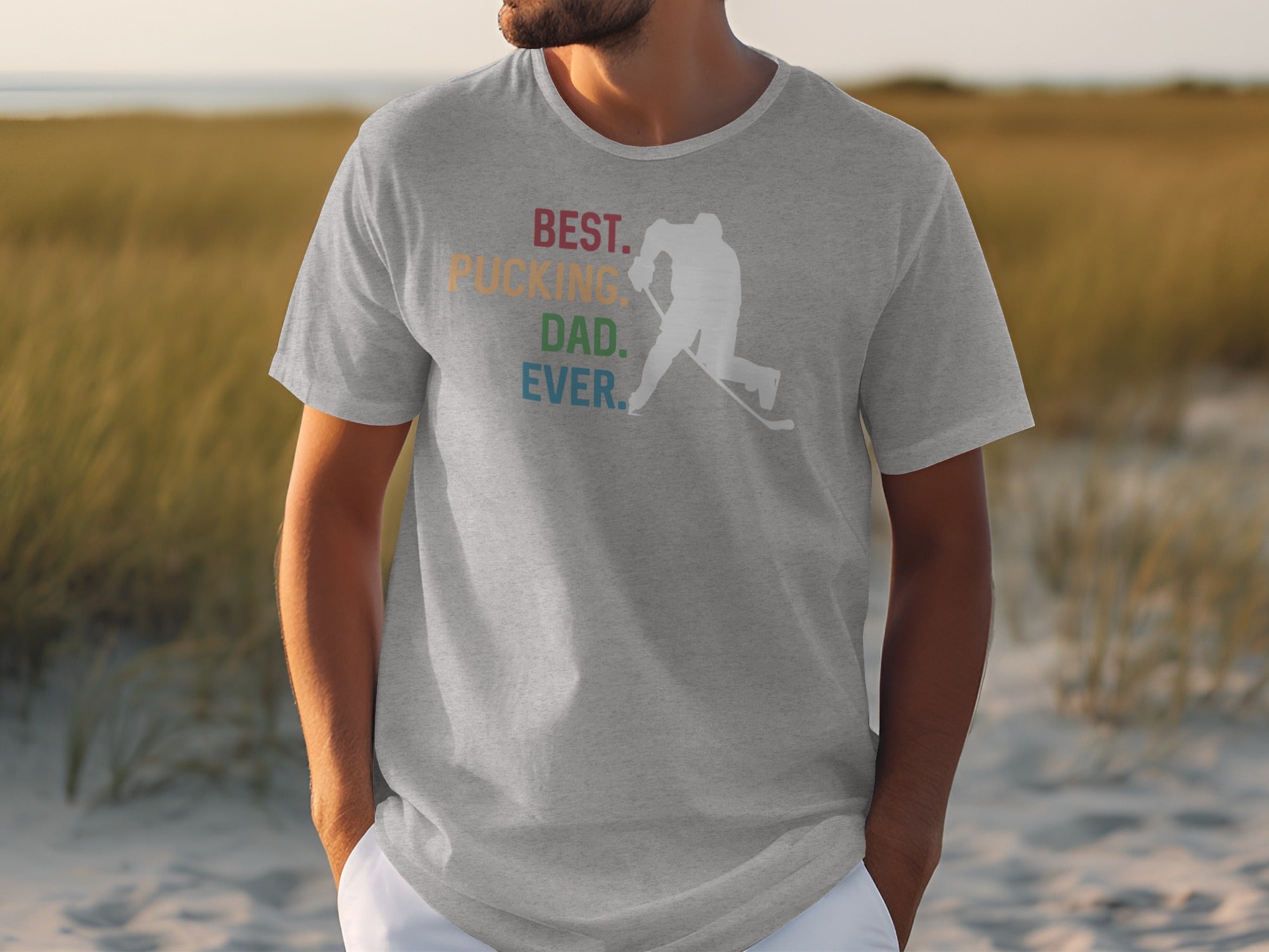 Grey t-shirt with "BEST. PUCKING. DAD. EVER." text and hockey player graphic.