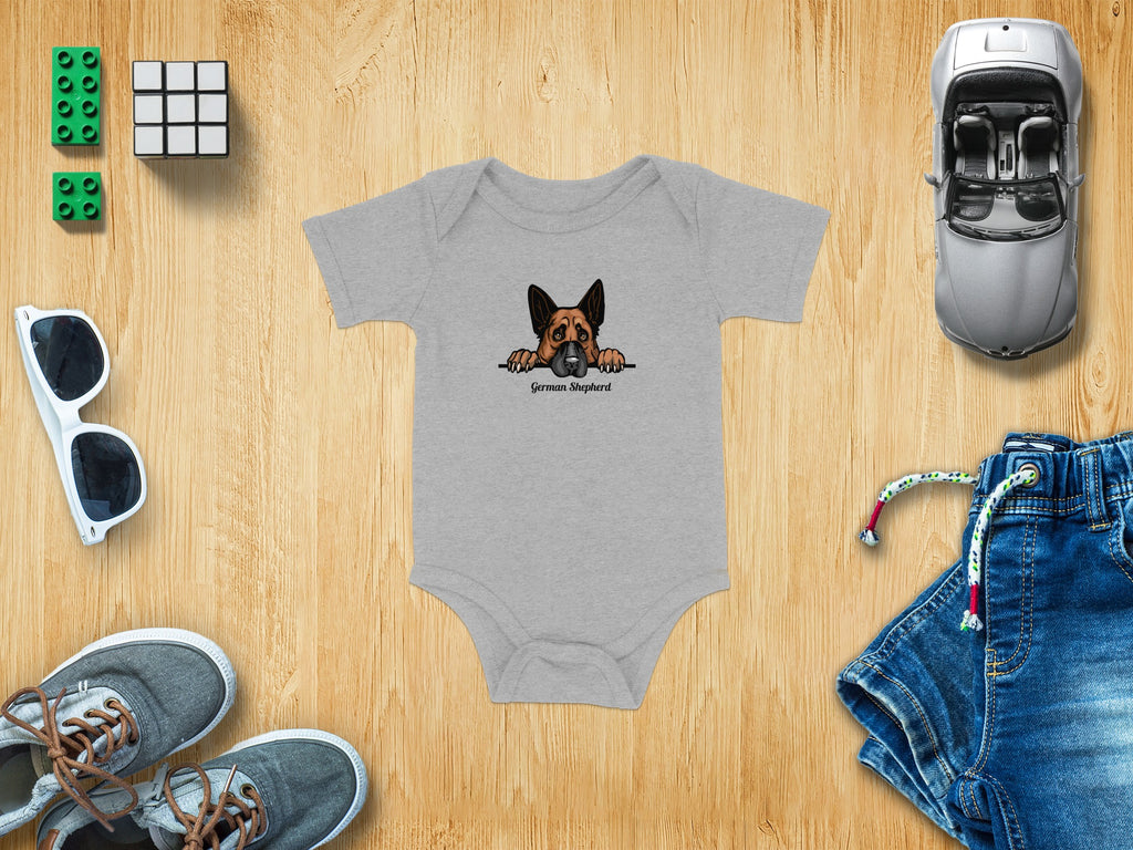 Grey baby onesie with a German Shepherd cartoon graphic and text.