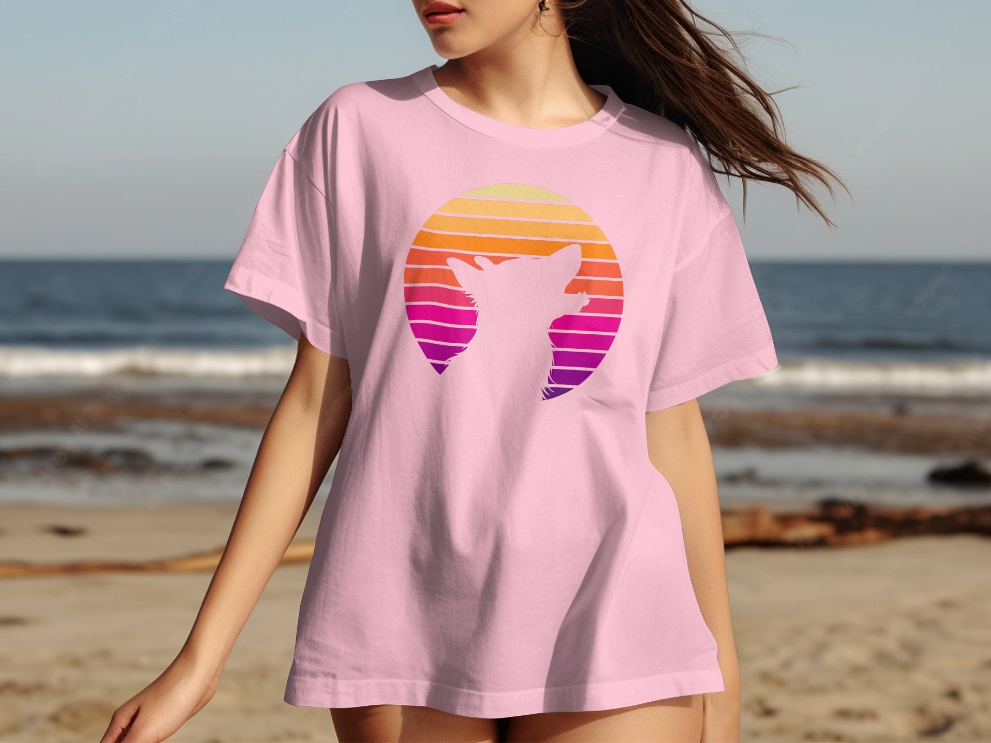 Pink t-shirt with a silhouette of a fox against a sunset circle gradient.