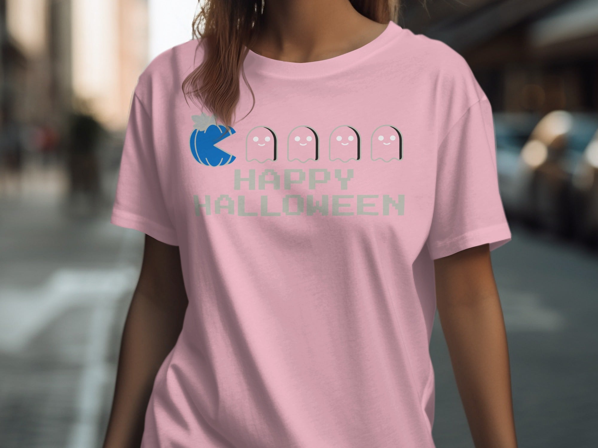 Pink t-shirt with blue Pac-Man pumpkin, ghosts, and "Happy Halloween" text.