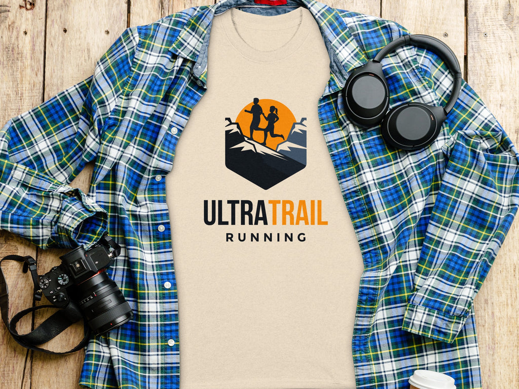 T-shirt with "ULTRA TRAIL RUNNING" text and graphic of runners on mountains.