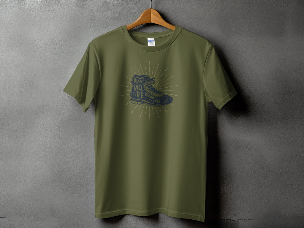 Olive green t-shirt with a vintage hiking boot graphic and text.