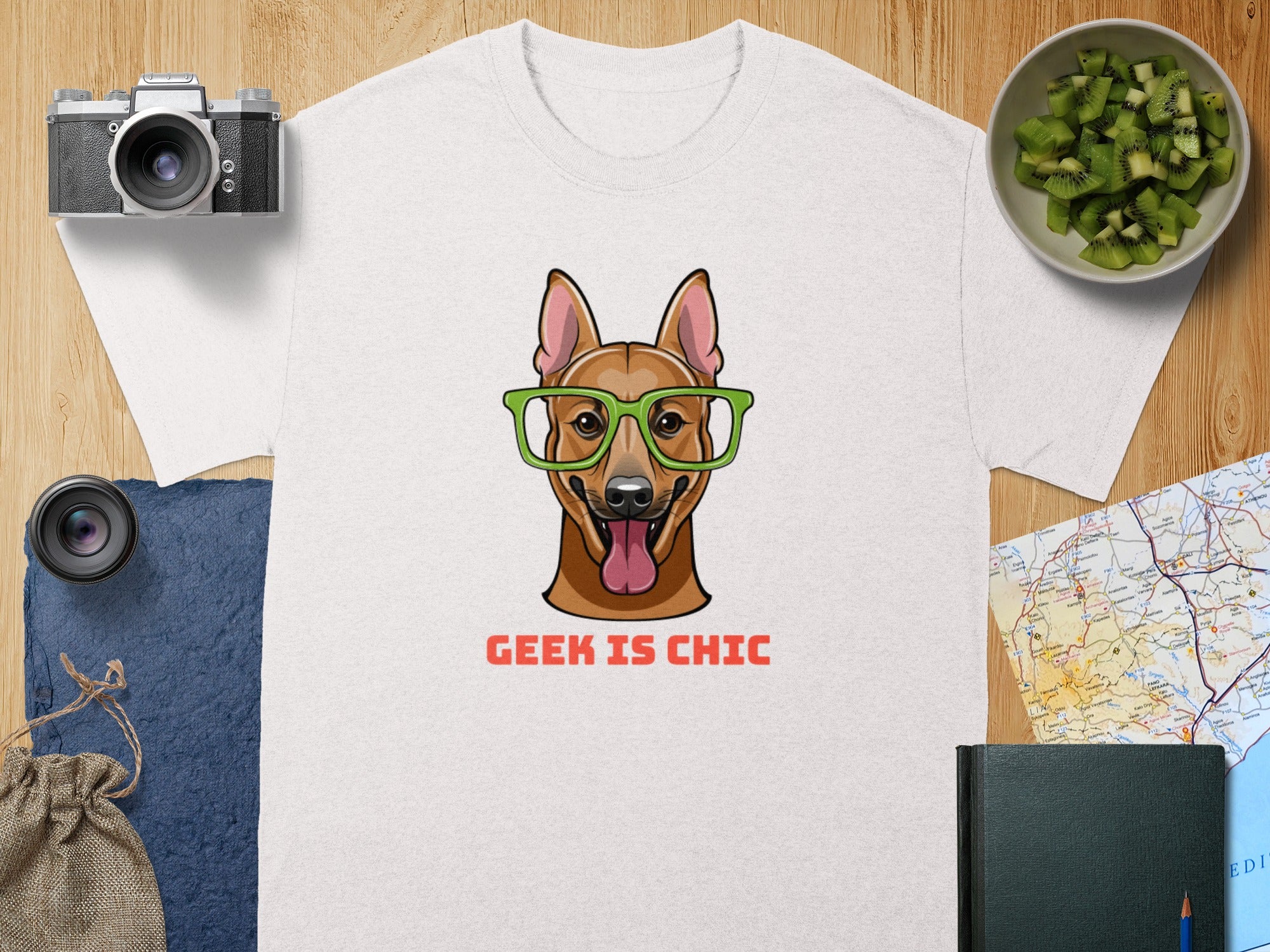 T-shirt with cartoon dog wearing glasses and text "GEEK IS CHIC".