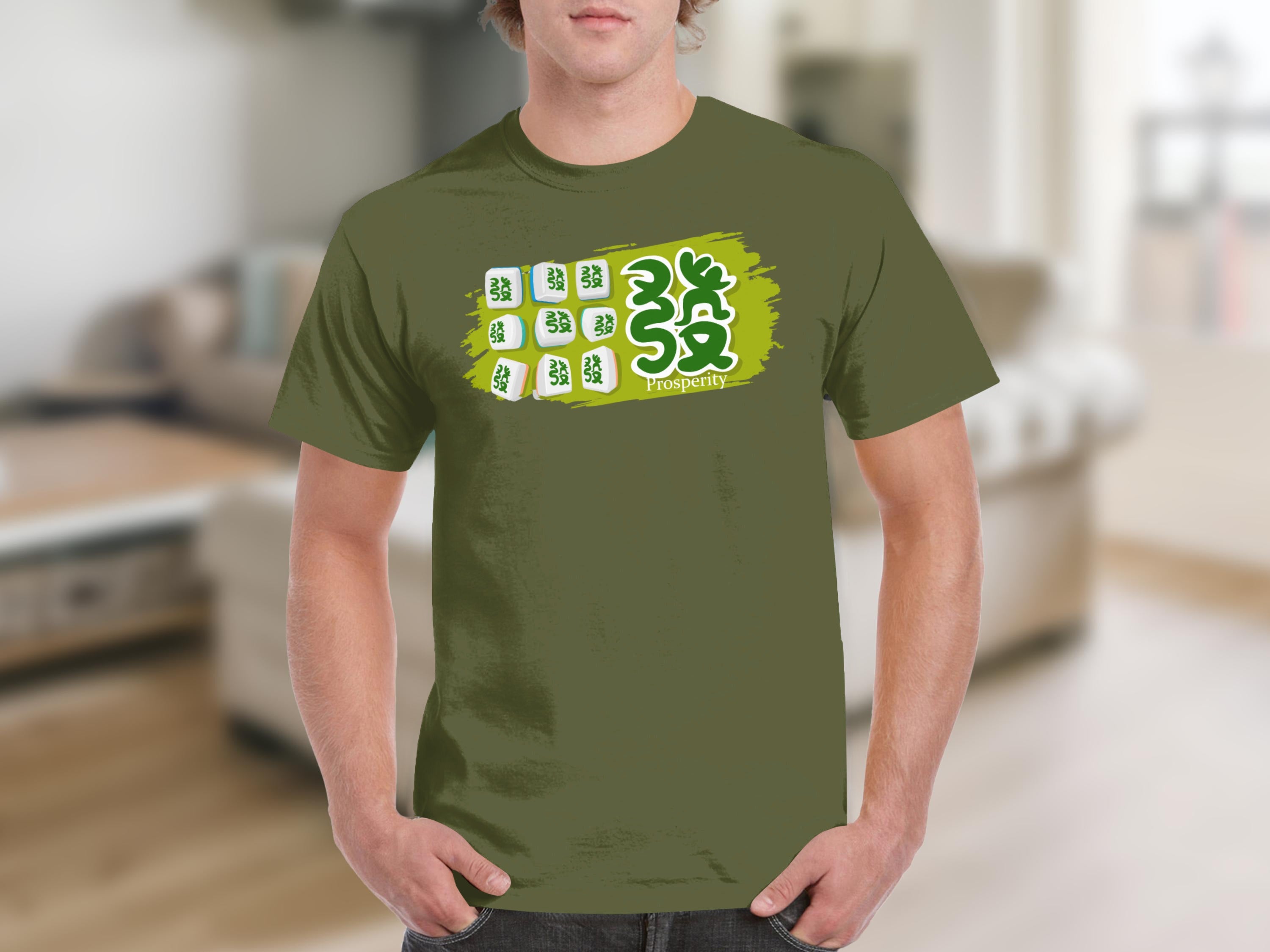 Green t-shirt with graphic of nine mahjong tiles and Chinese characters for prosperity.