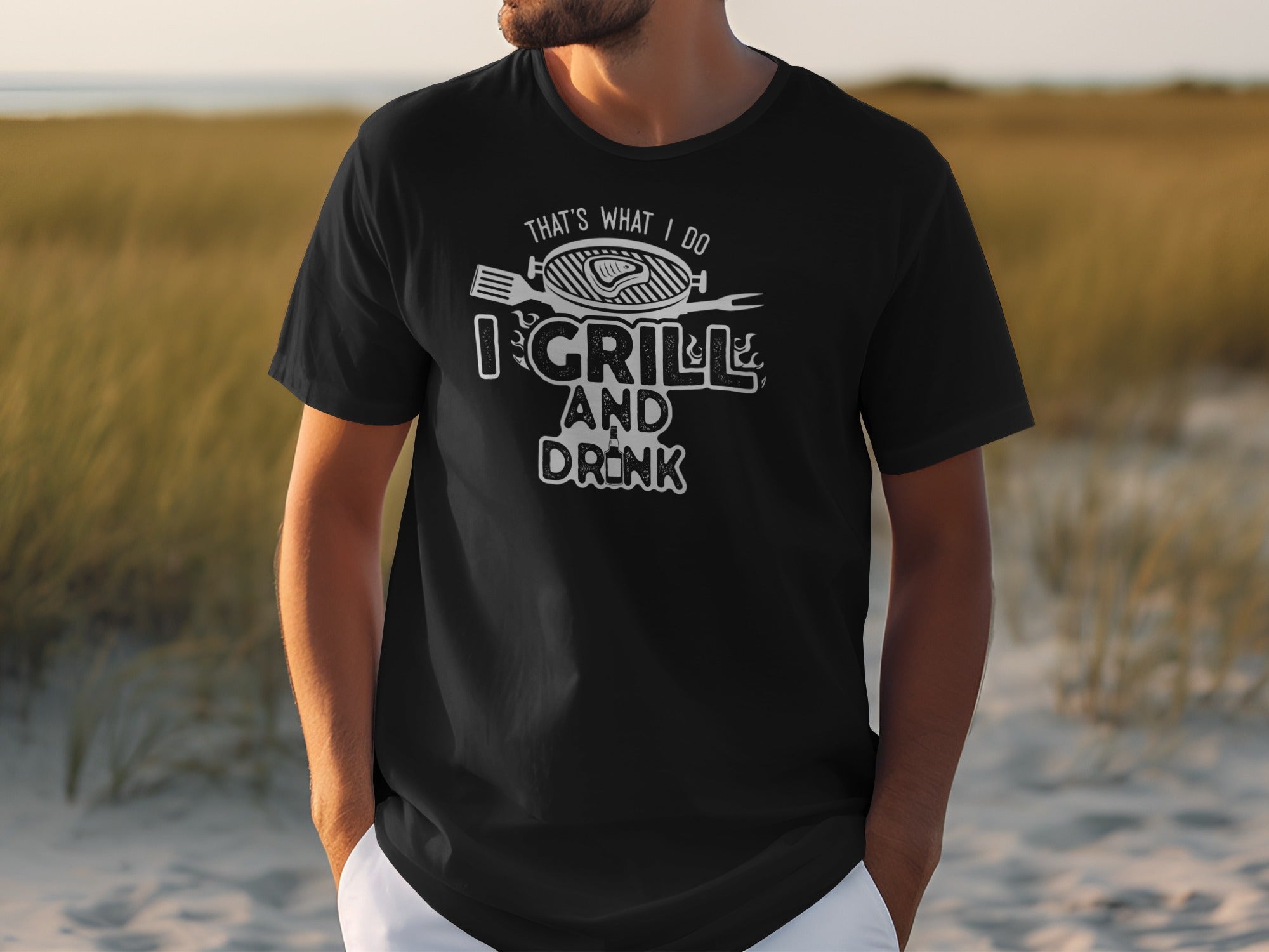 Black t-shirt with "That's What I Do I Grill And Drink" text and graphics.