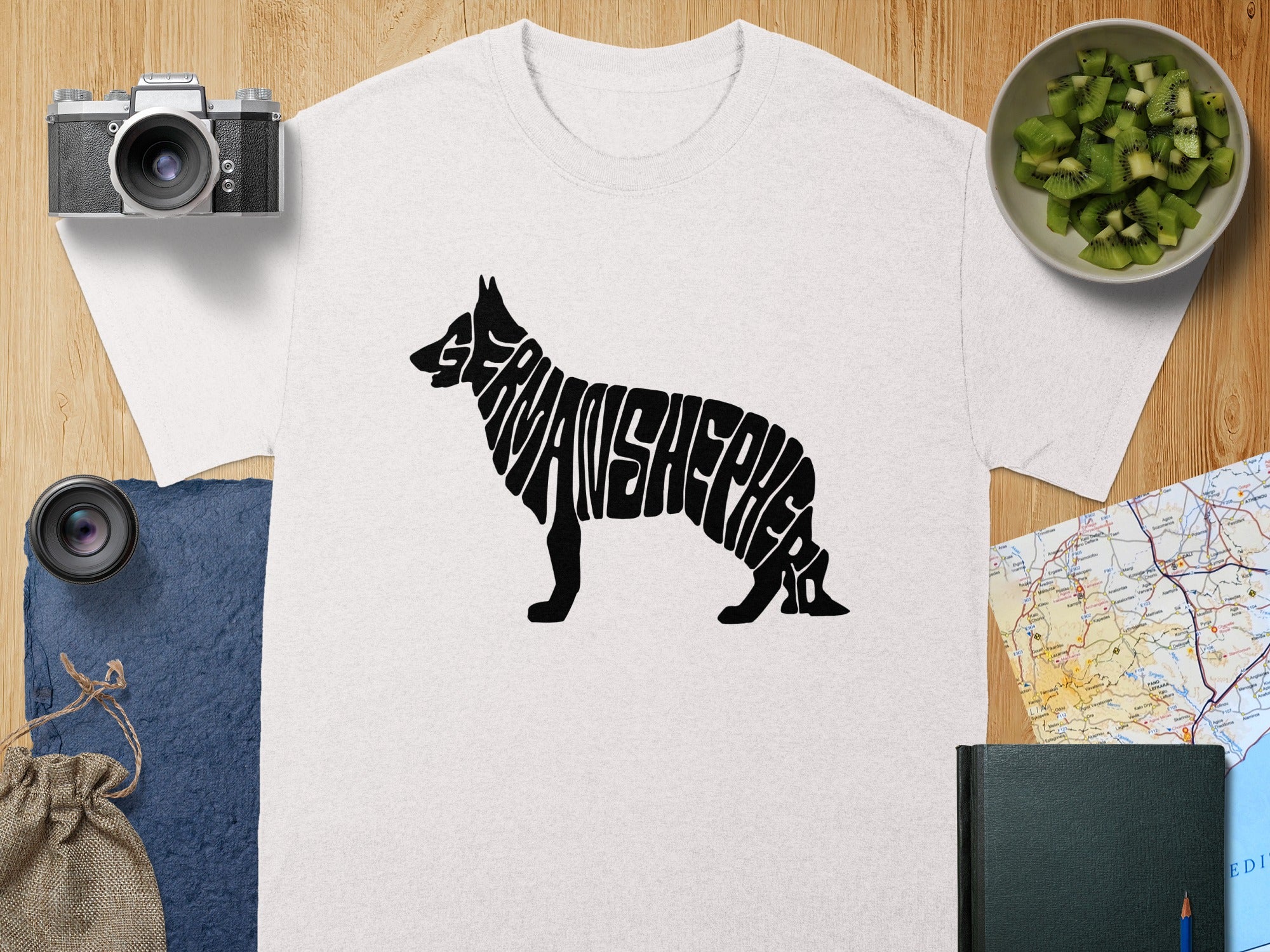 T-shirt with black German Shepherd silhouette filled with "GERMANSHEPHERD" text.