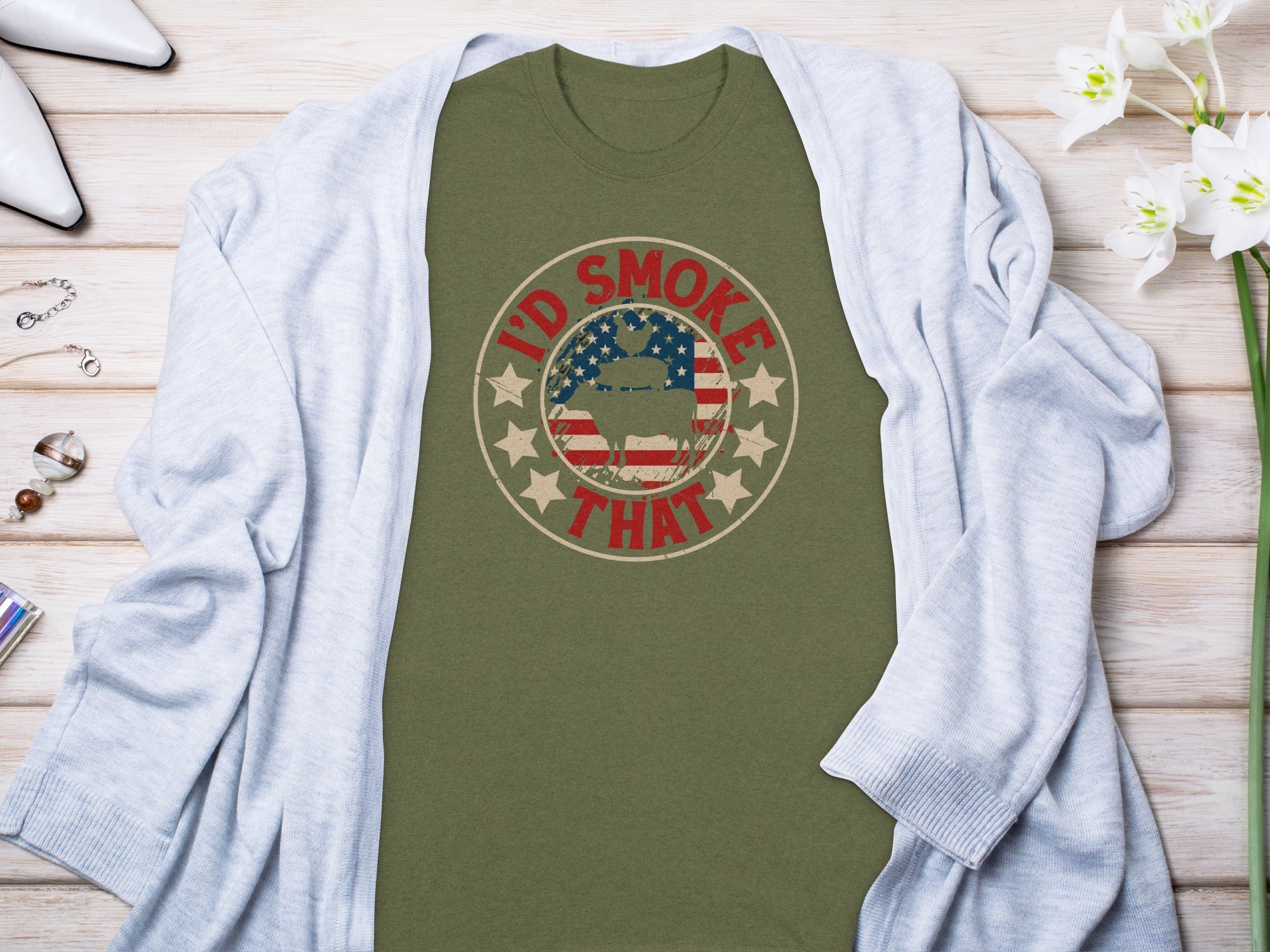 Olive green t-shirt with distressed circular graphic and text "I'D SMOKE THAT"