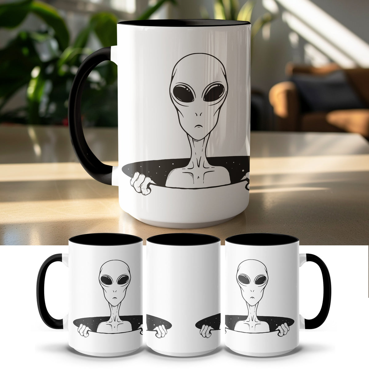 White mug with black interior and handle featuring a black outline drawing of an alien emerging from a starry void.