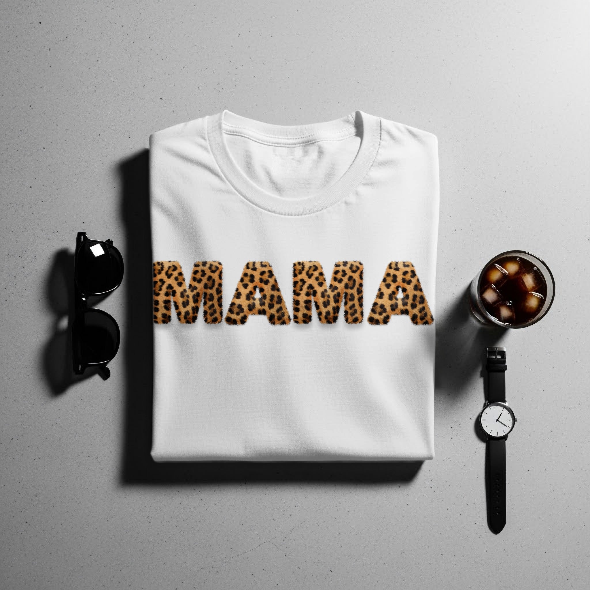 White t-shirt with "MAMA" in leopard print letters.