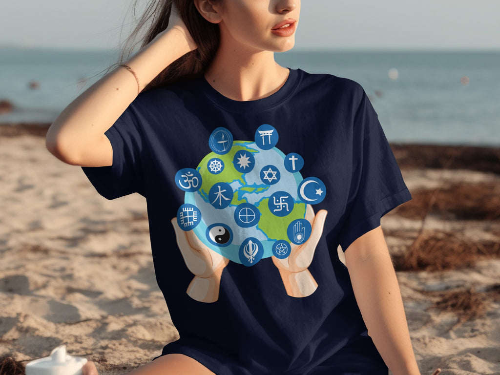 T-shirt design features hands holding Earth with various religious and cultural symbols.