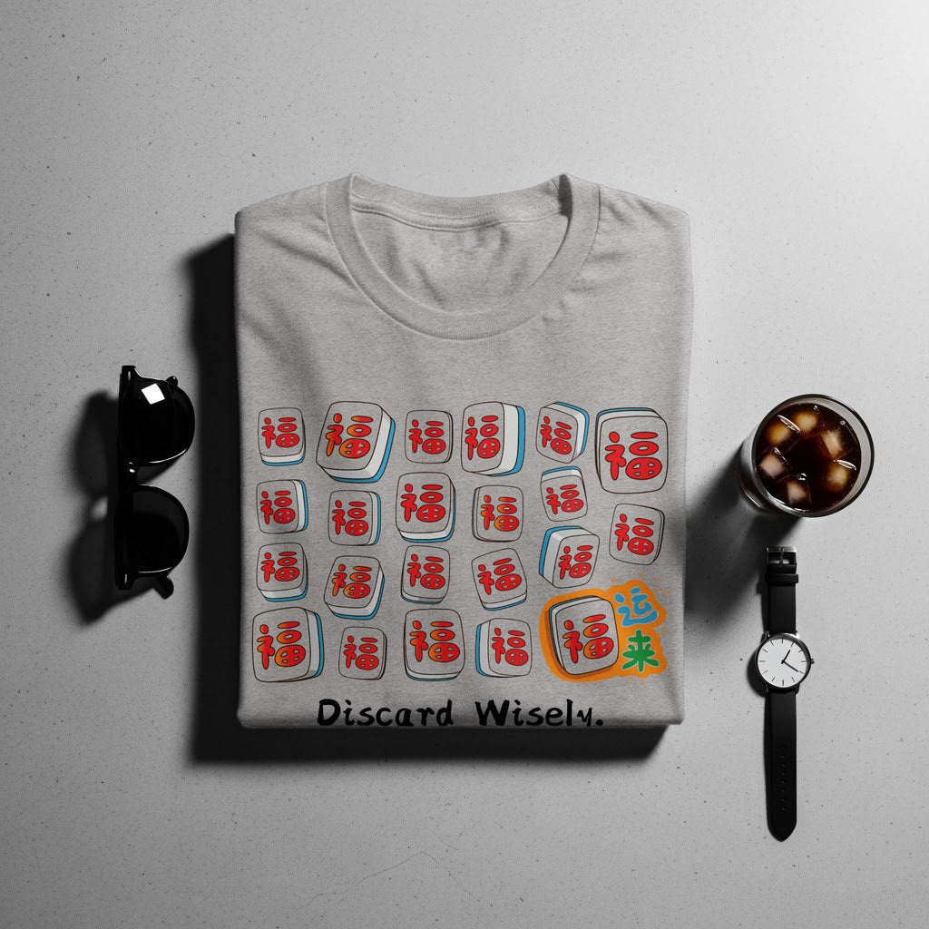 Light grey t-shirt with mahjong tiles graphic and "Discard Wisely." text.