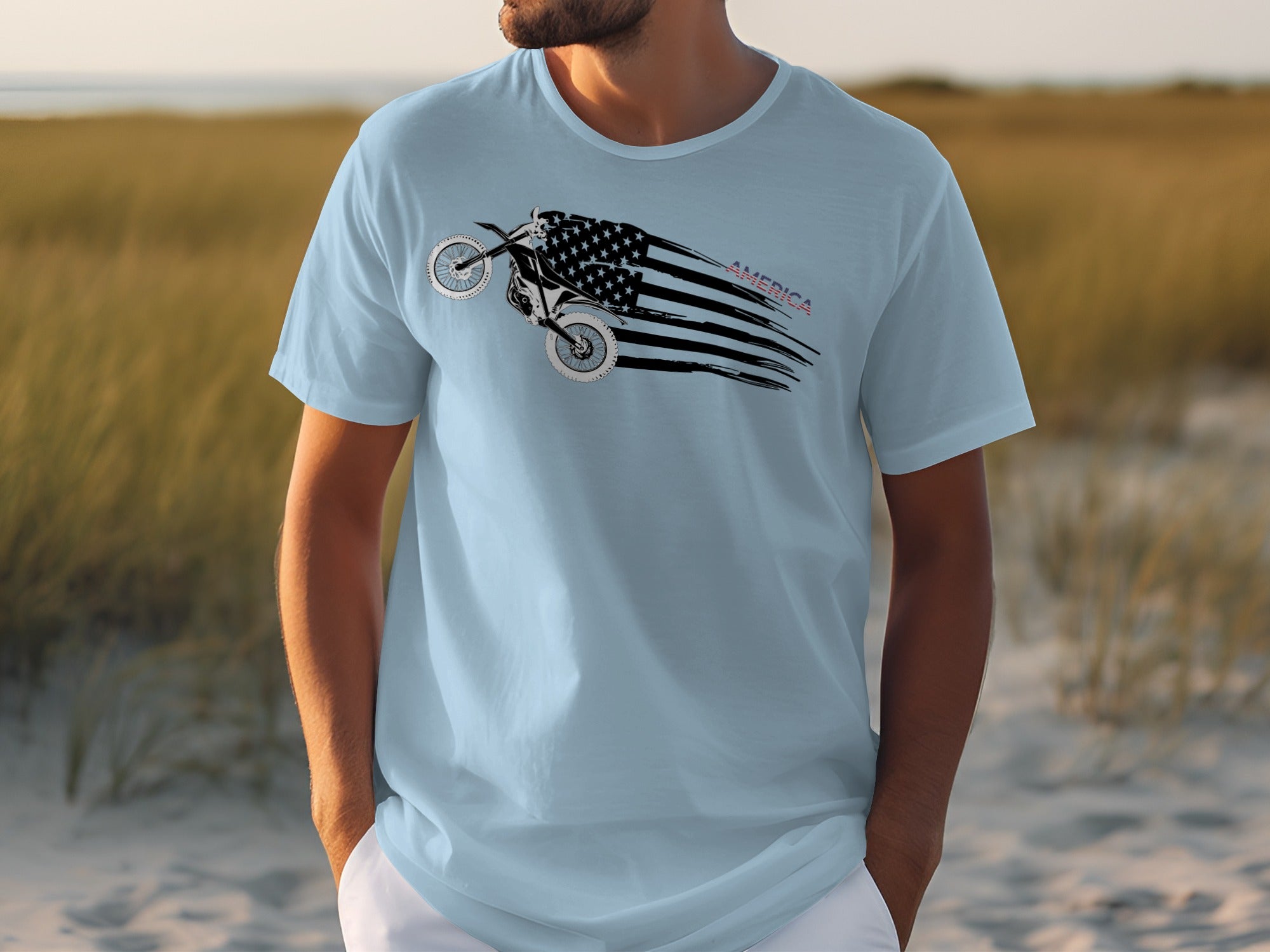 Light blue t-shirt with motorcycle and American flag graphic and "AMERICA" text.