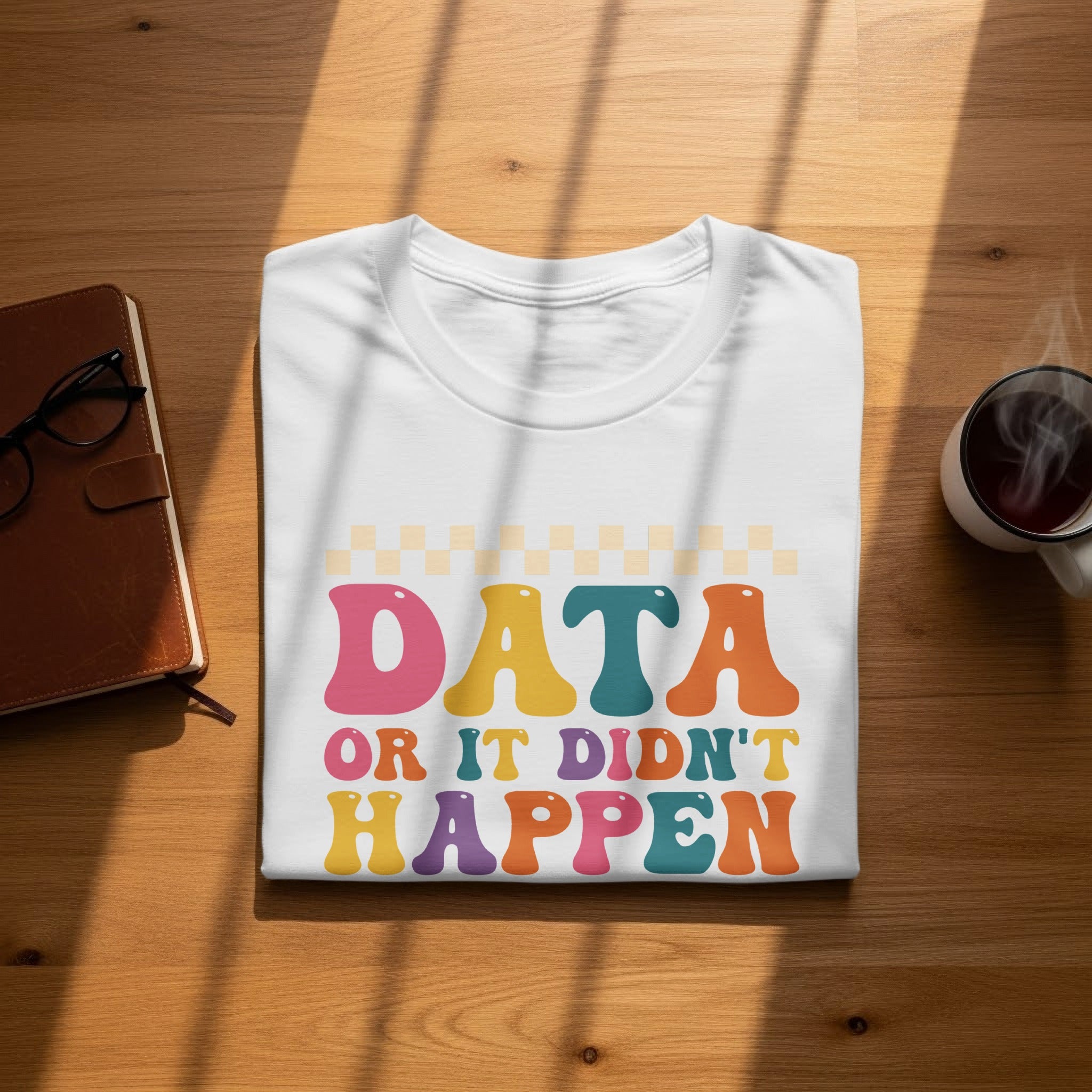 White t-shirt with colorful retro text that reads "DATA OR IT DIDN'T HAPPEN".