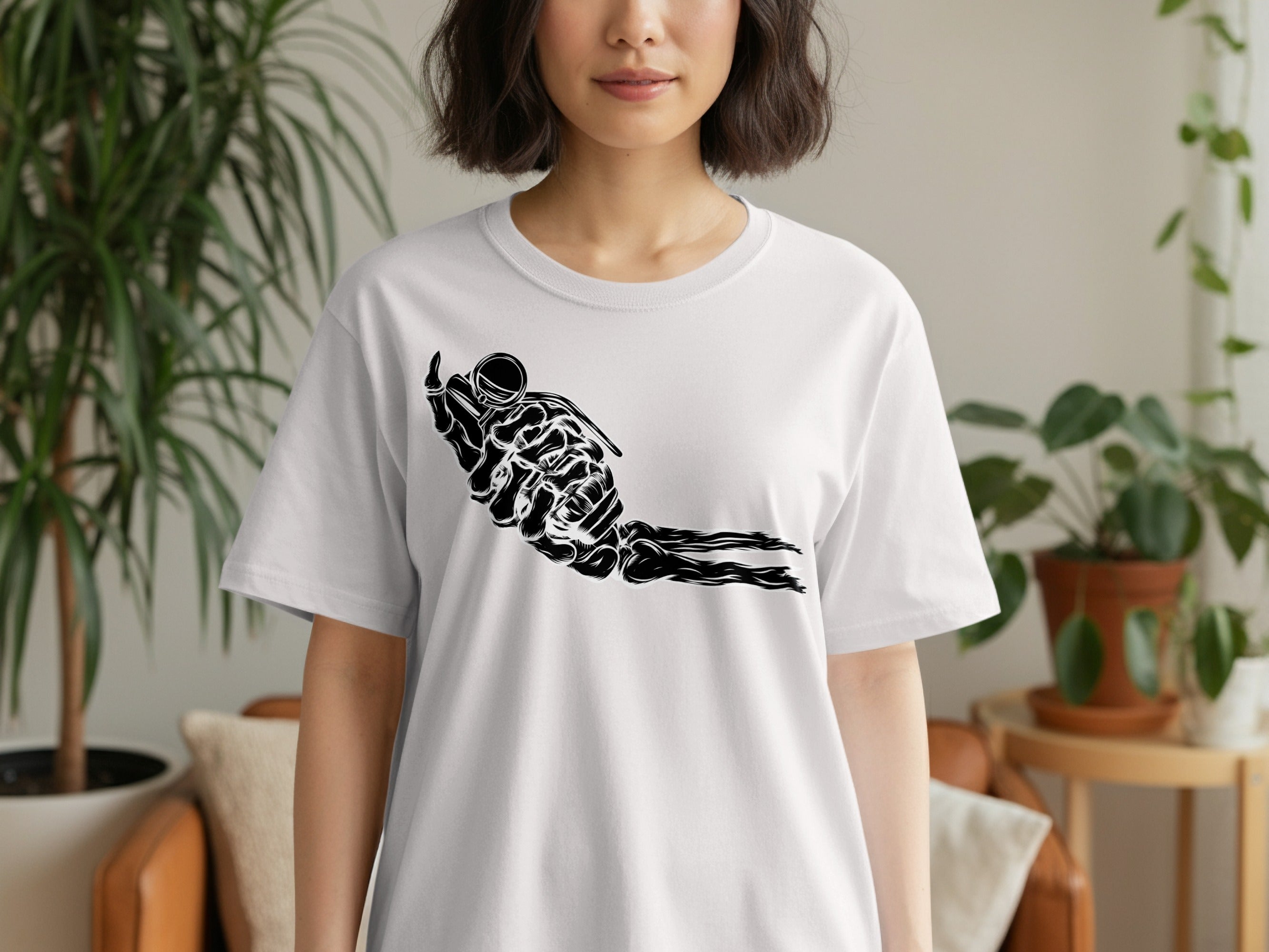 White t-shirt with a black graphic of a skeletal hand holding a grenade.