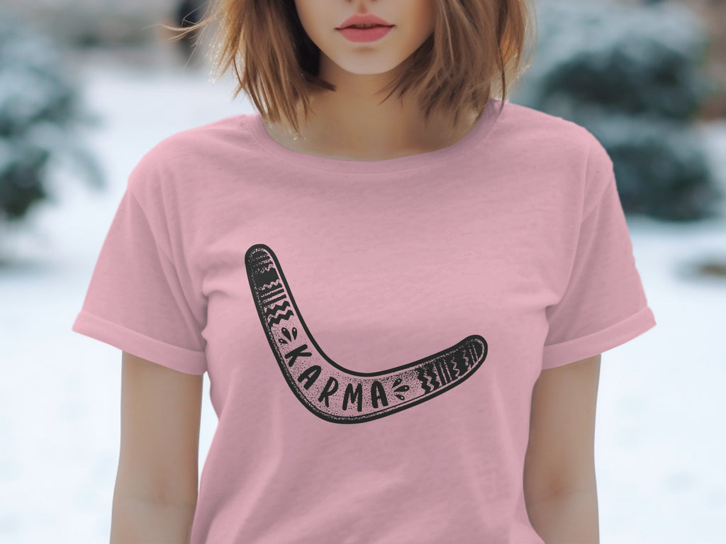 Pink t-shirt with a black boomerang graphic and the word "karma" on it.
