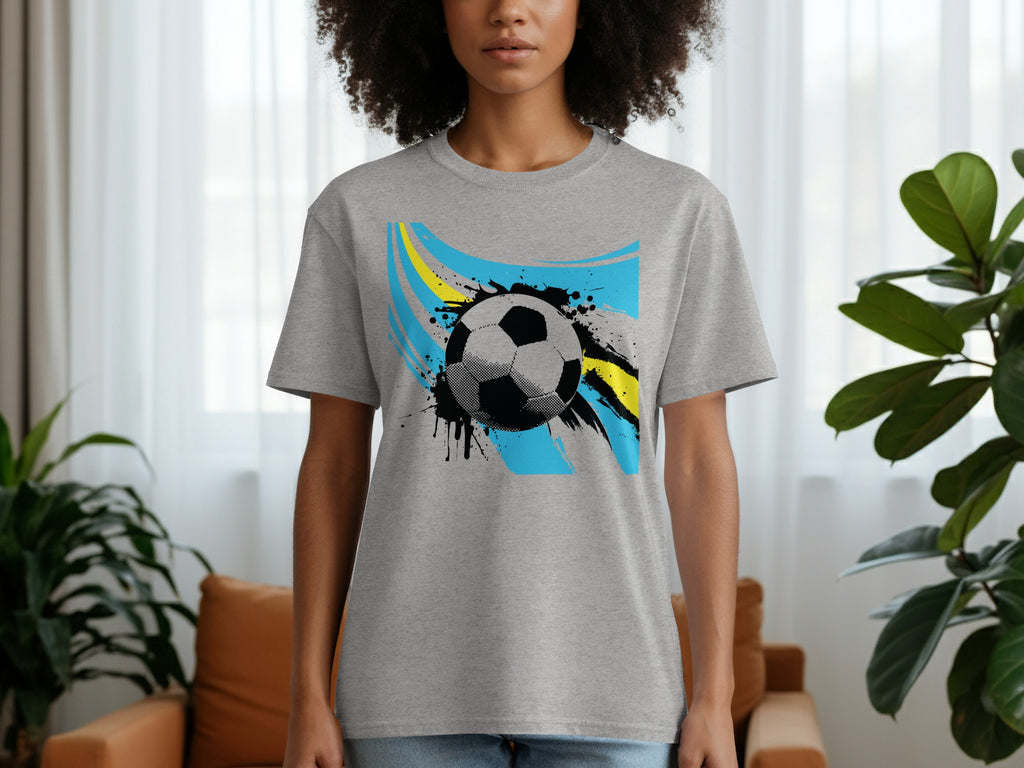 Grey t-shirt with a distressed soccer ball graphic and blue and yellow streaks.