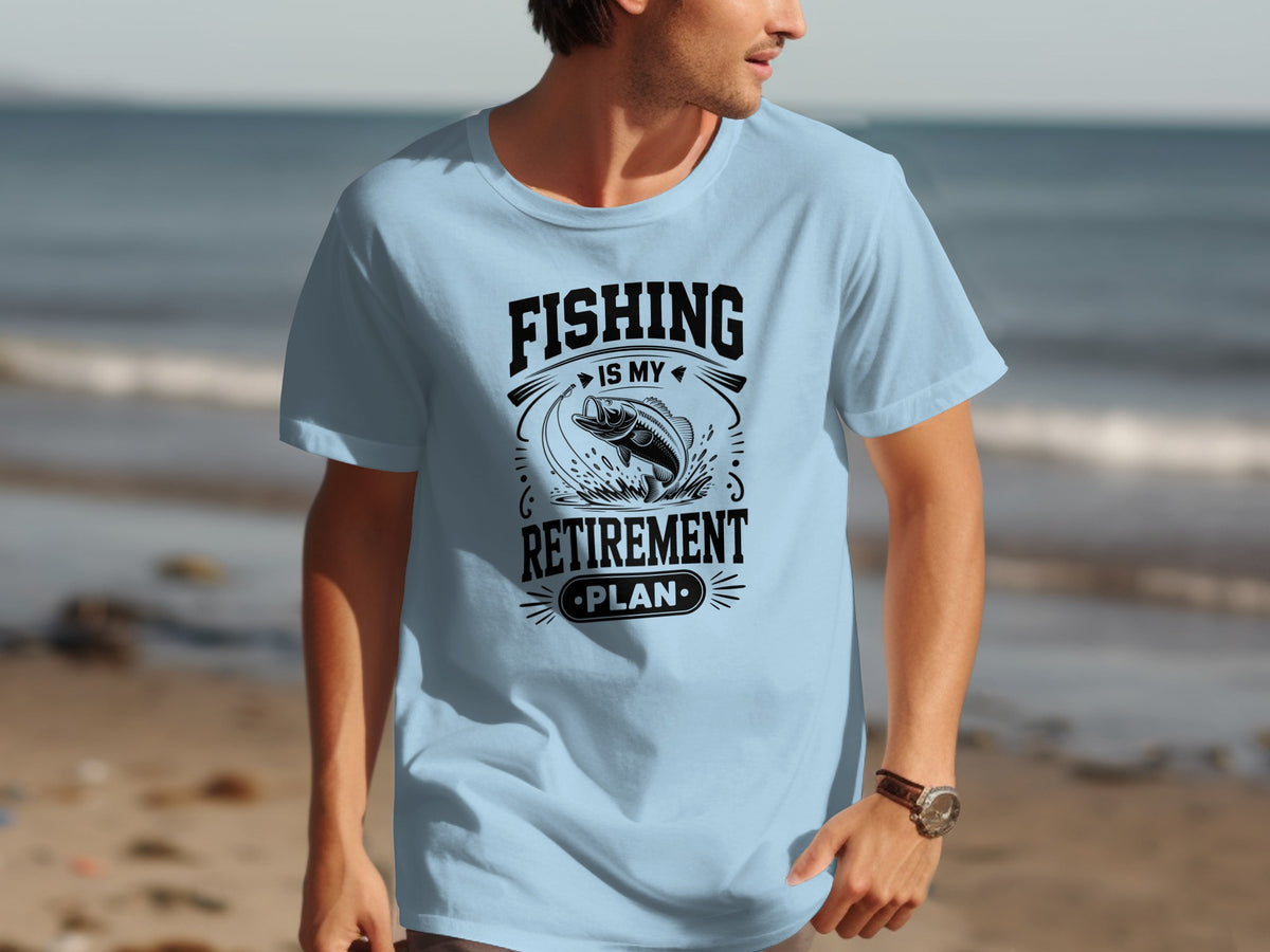 Light blue t-shirt with black text and a leaping fish graphic: "FISHING IS MY RETIREMENT PLAN."