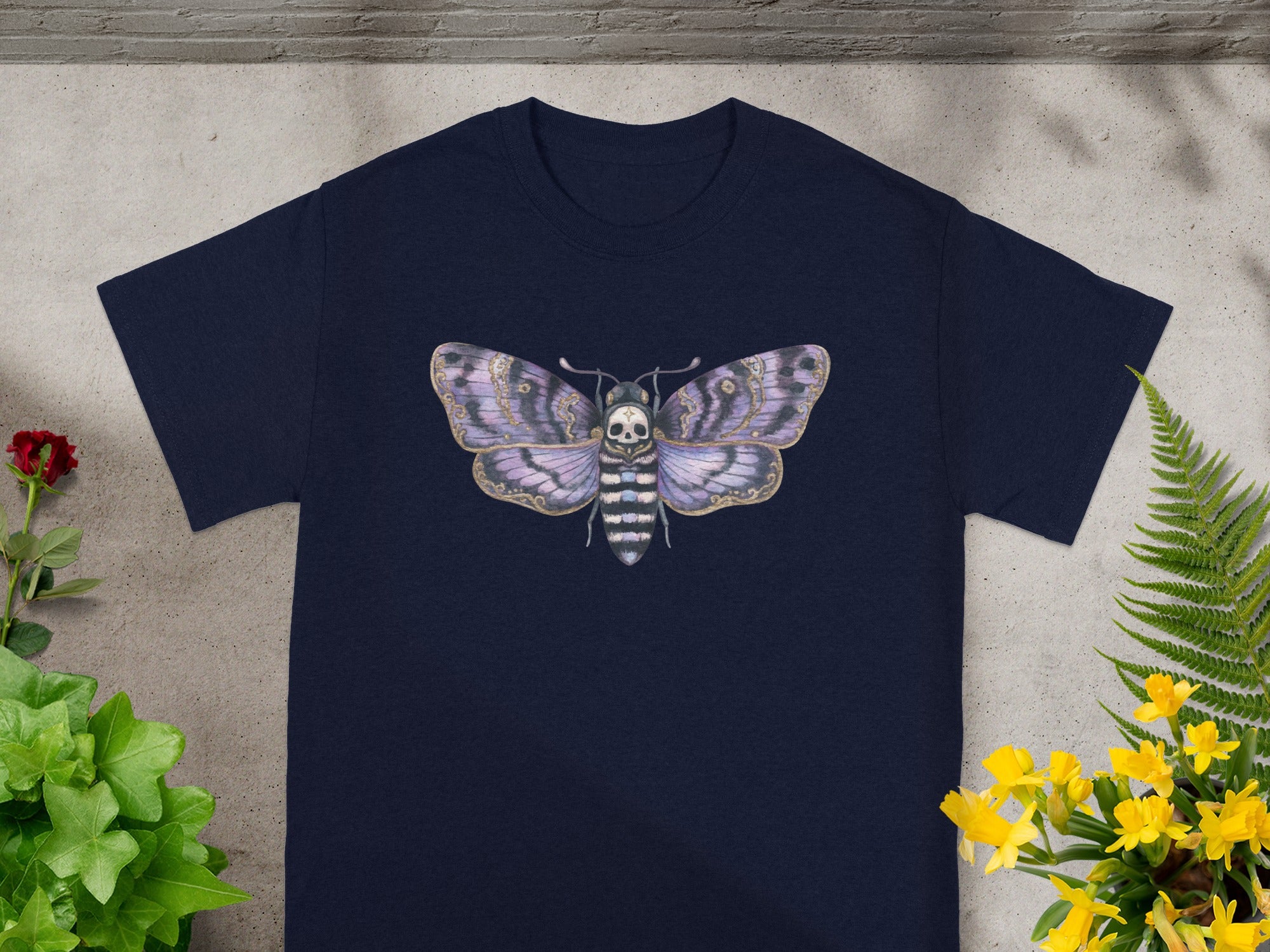 Navy blue t-shirt with a detailed skull-faced moth graphic.
