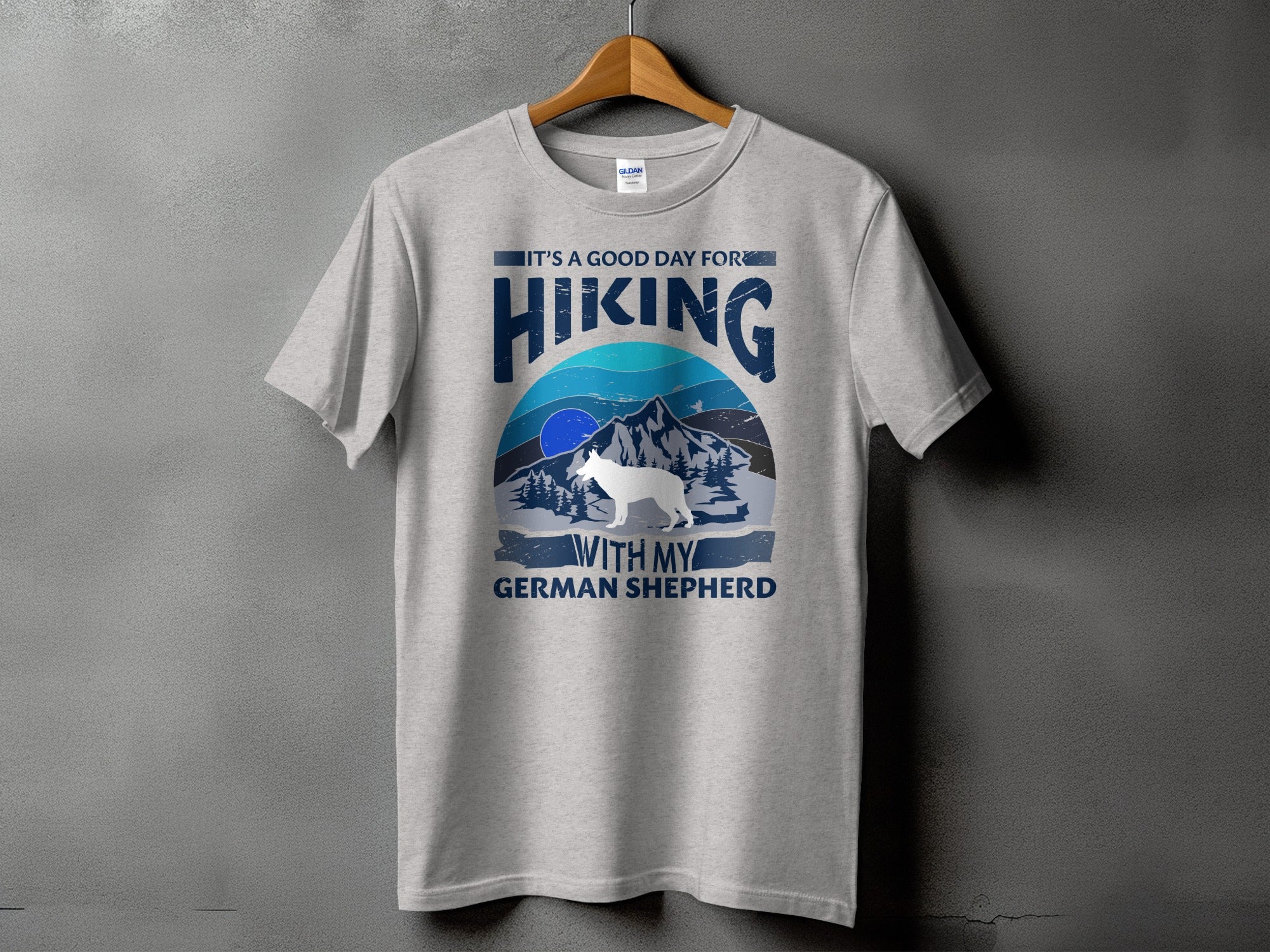 Gray t-shirt with "IT'S A GOOD DAY FOR HIKING WITH MY GERMAN SHEPHERD" graphic.