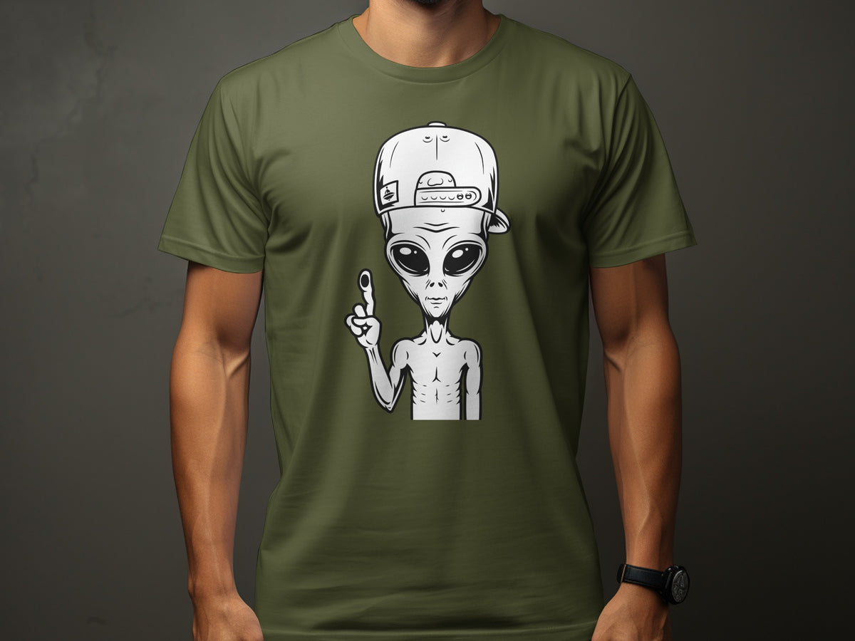 Alien wearing a backward baseball cap, pointing index finger, on a green t-shirt.