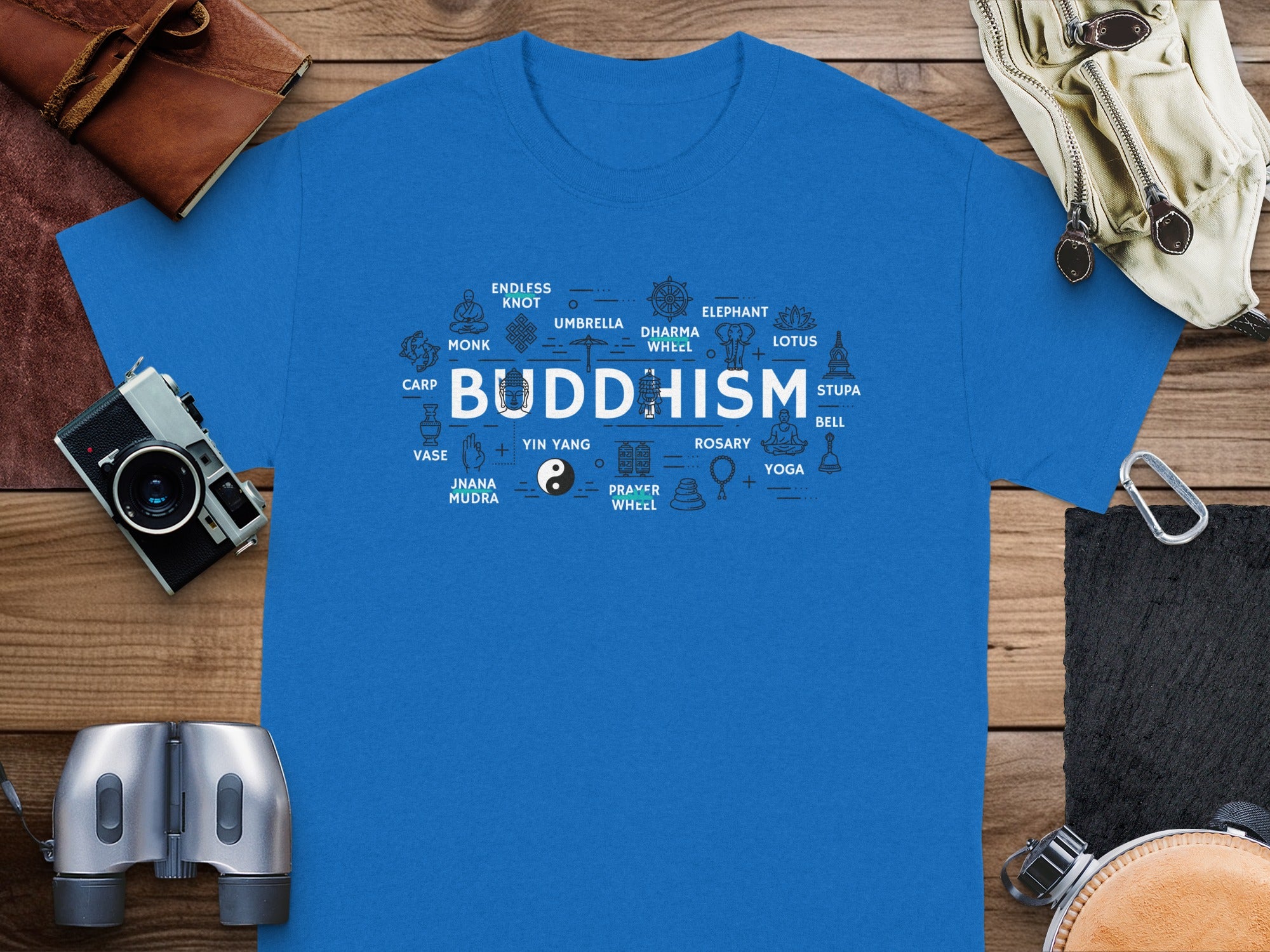 Blue t-shirt with "BUDDHISM" and symbols like lotus, elephant, and stupa.
