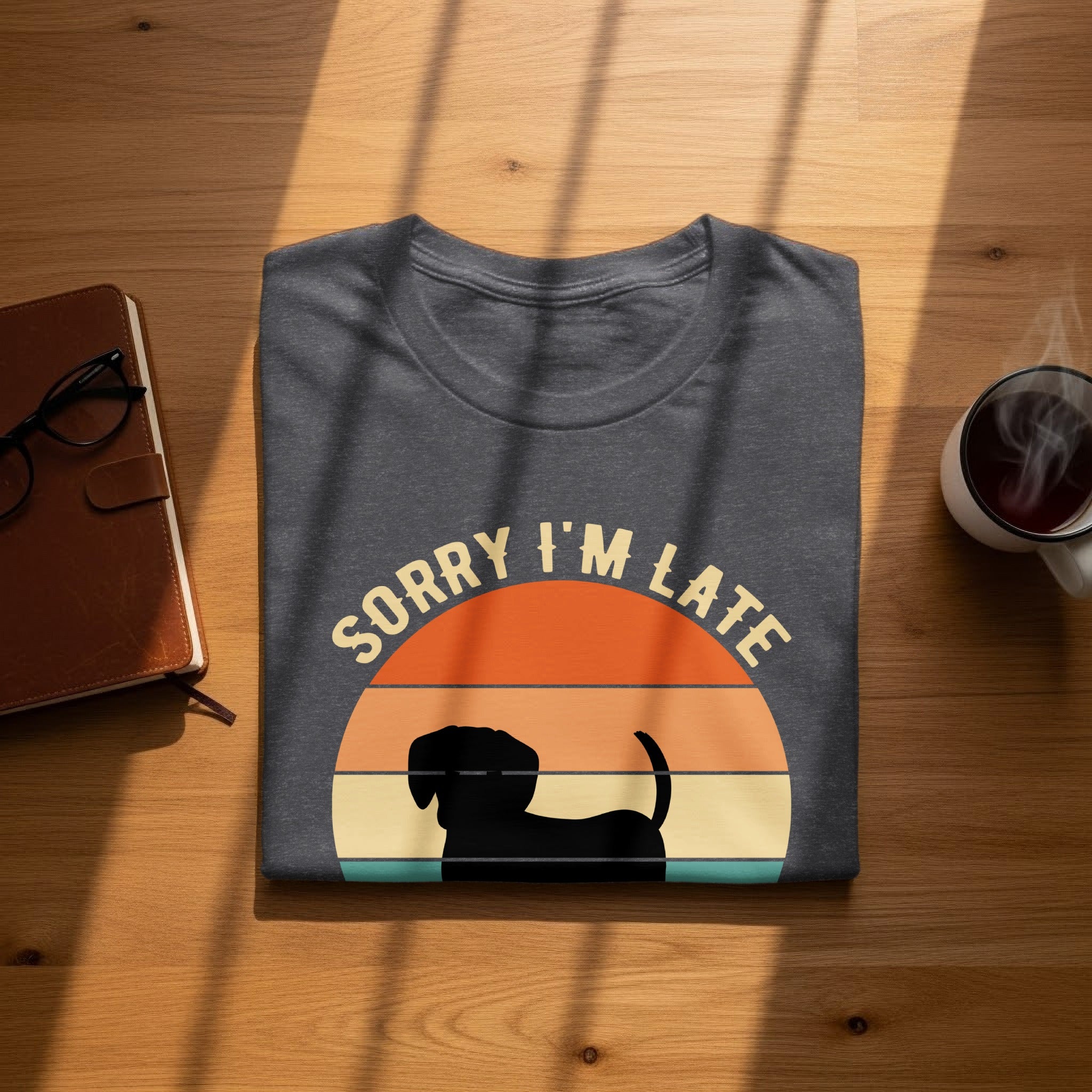 Dark grey t-shirt with a silhouette of a dachshund and the text "SORRY I'M LATE".