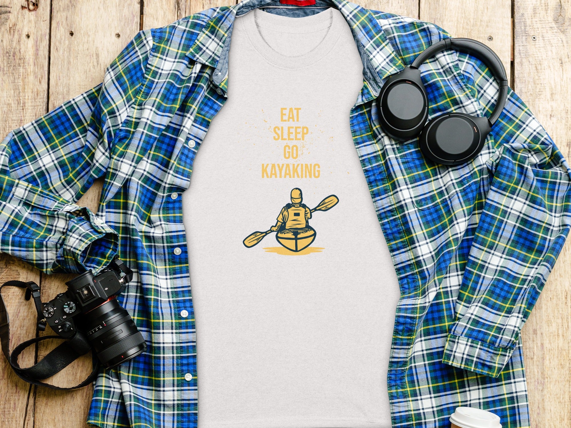 White t-shirt with "Eat Sleep Go Kayaking" text and kayak graphic.
