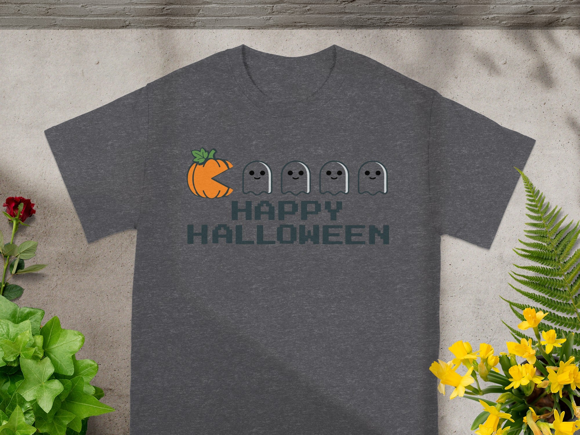 Dark gray t-shirt with pumpkin and ghosts graphic and "HAPPY HALLOWEEN" text.