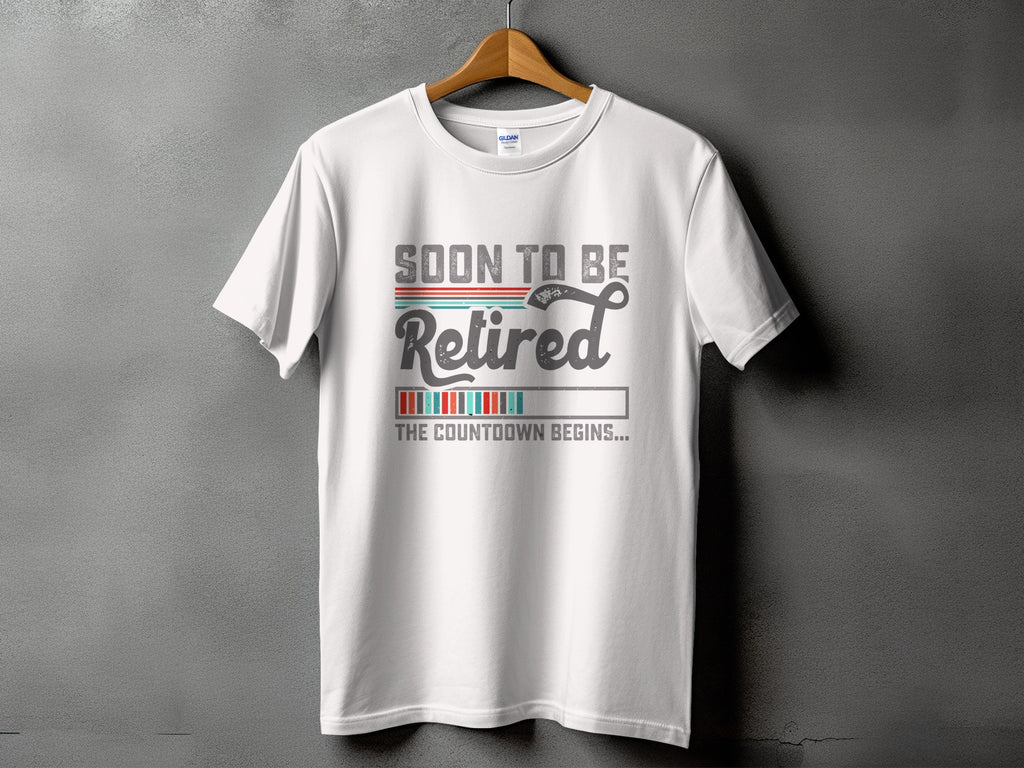 White t-shirt with "SOON TO BE Retired THE COUNTDOWN BEGINS..." text and progress bar.