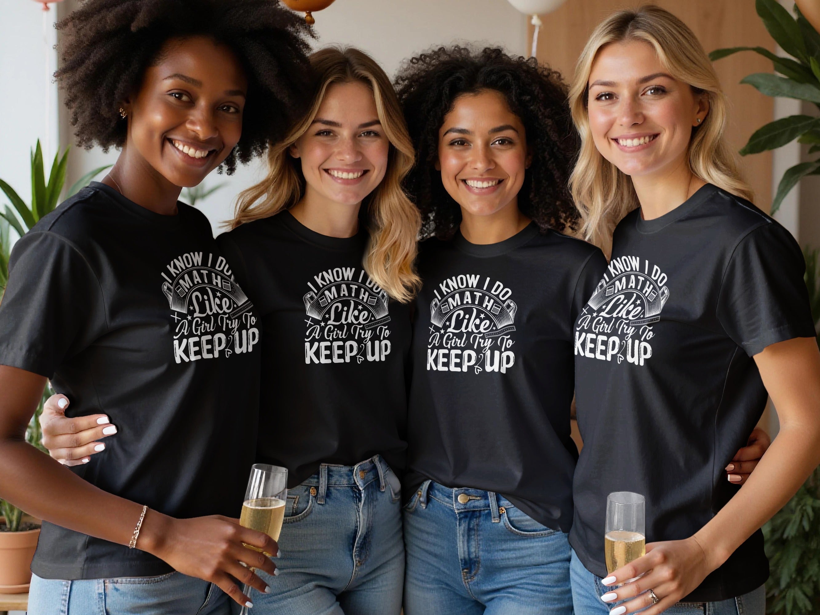 Four women in black t-shirts with "I Know I Do Math Like A Girl Try To Keep Up" slogan and designs.