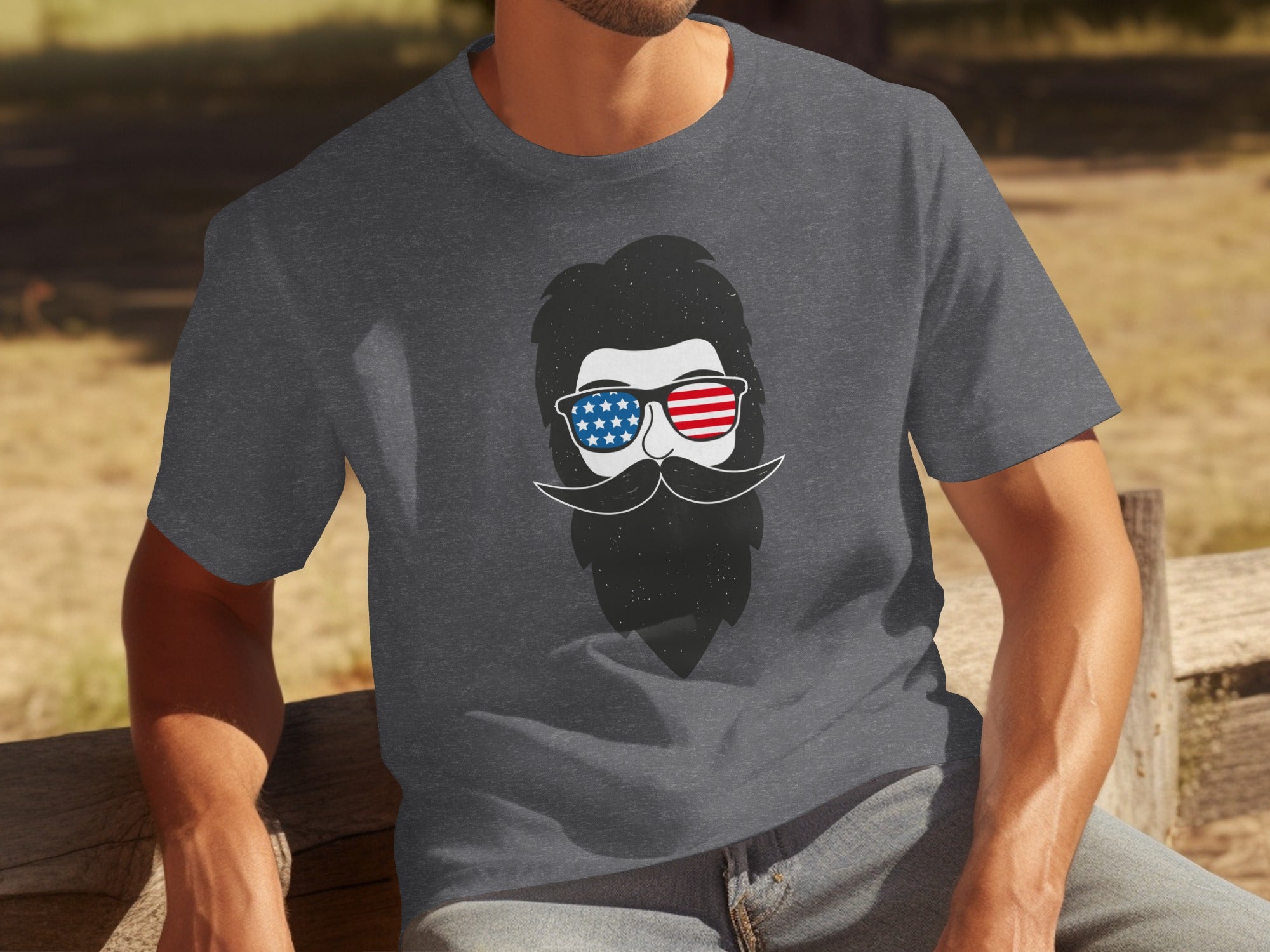 T-shirt with a graphic of a bearded man wearing American flag sunglasses.