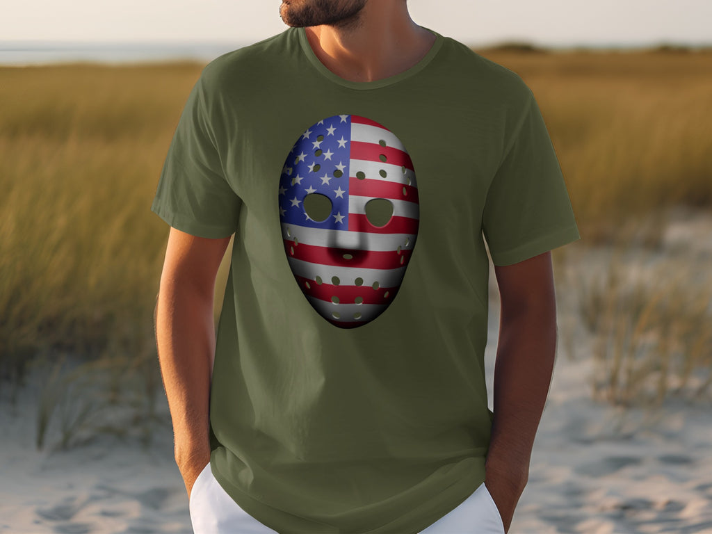 Green t-shirt with a red, white, and blue American flag hockey mask graphic.