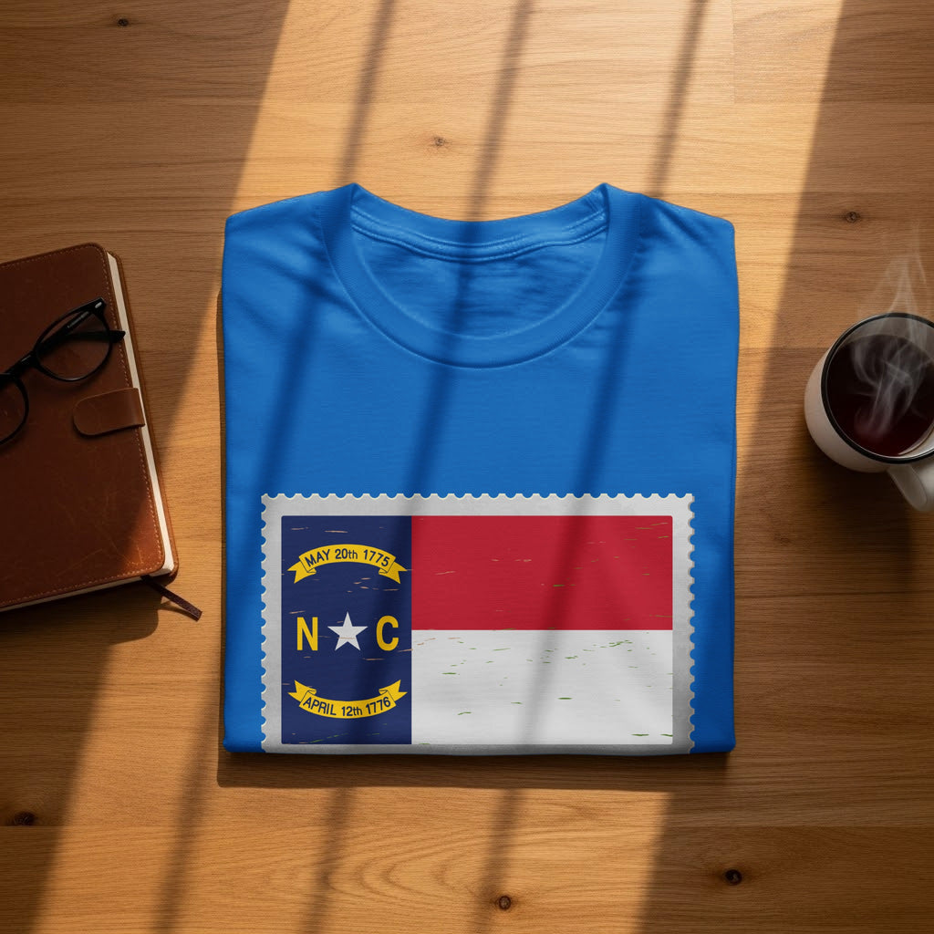 Blue t-shirt with North Carolina flag and dates "May 20th 1775" and "April 12th 1776".