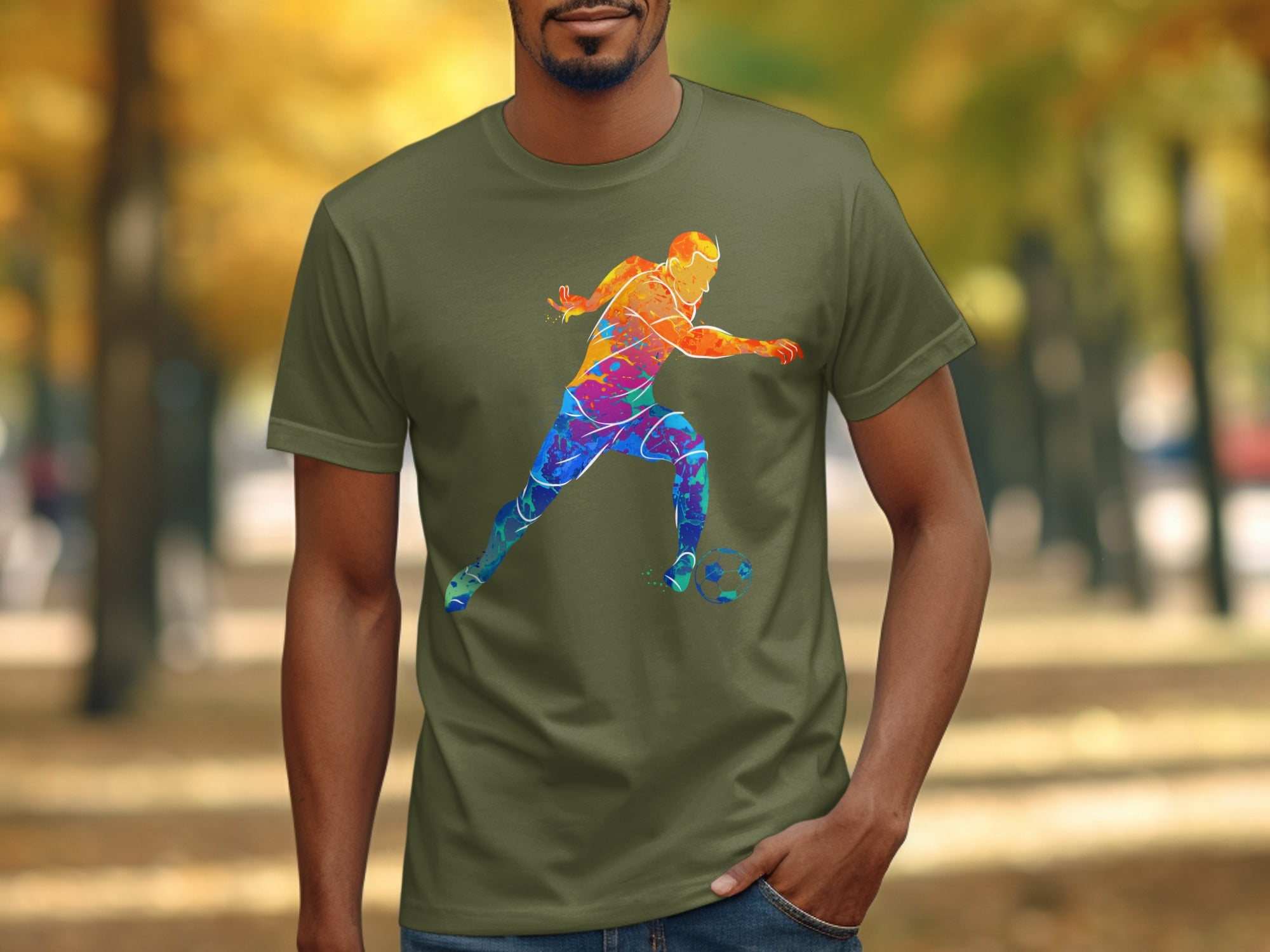 Green t-shirt with colorful soccer player graphic dribbling a ball