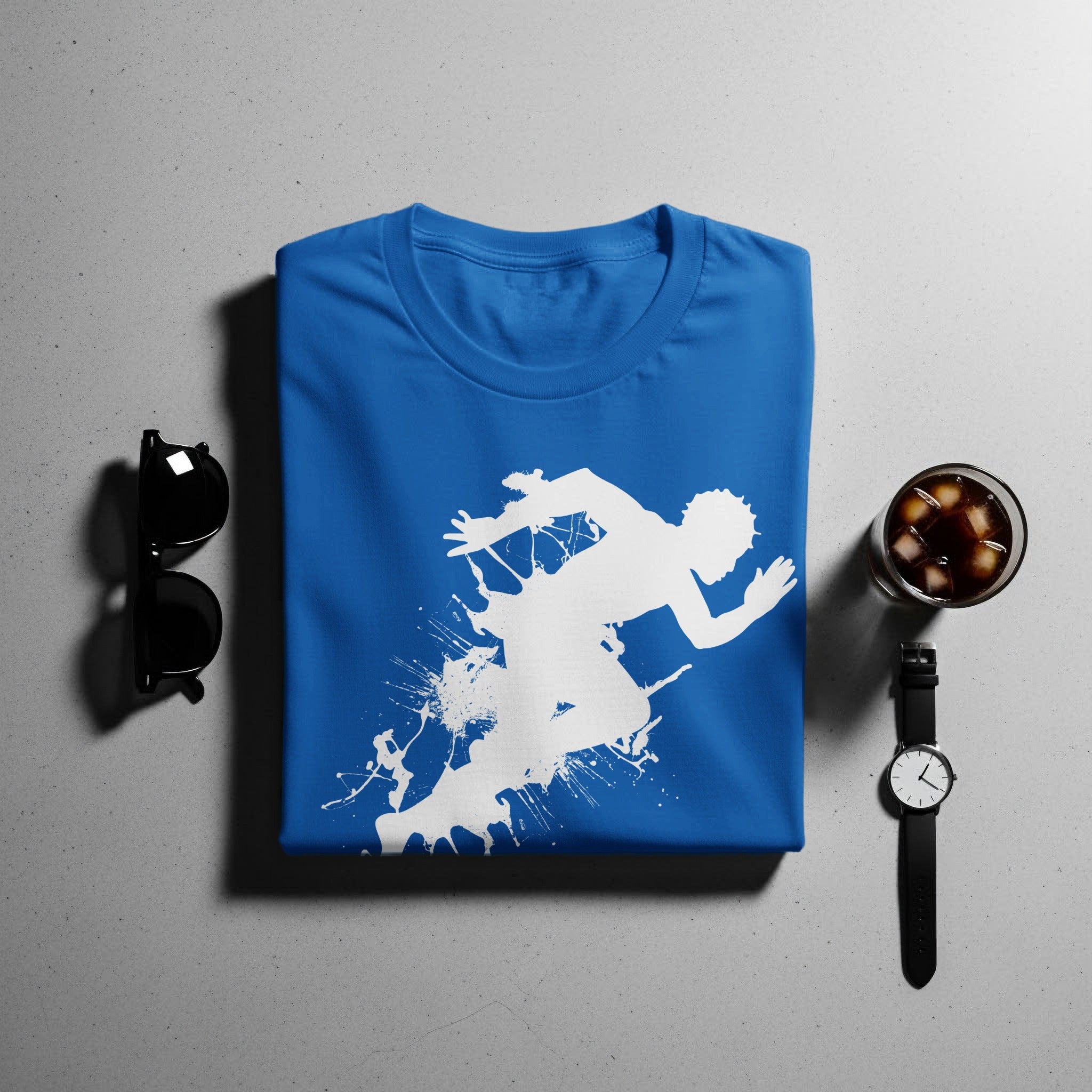 Blue t-shirt with white silhouette of runner and paint splatters.