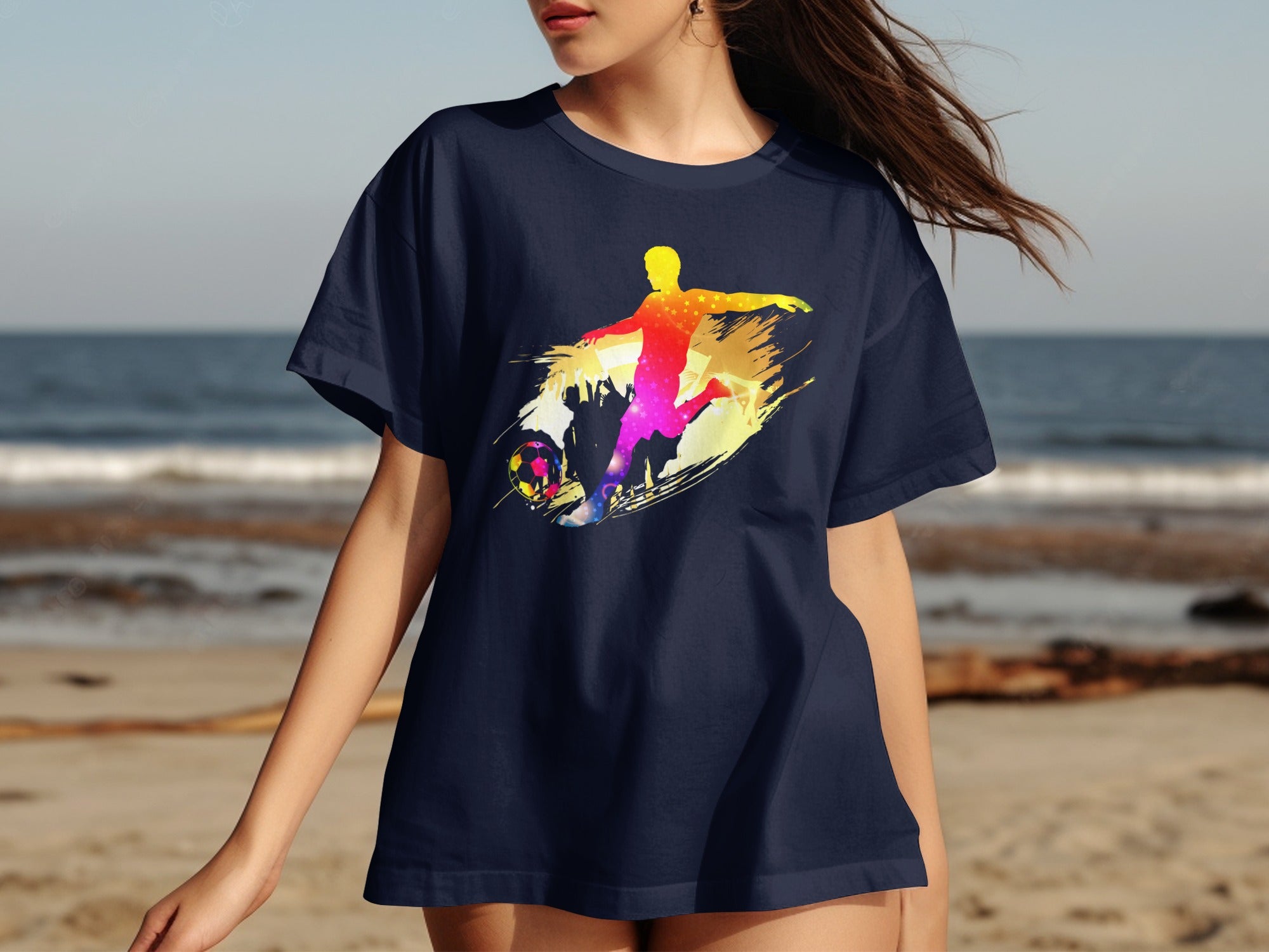 Dark blue t-shirt with a colorful, abstract soccer player kicking a ball graphic.