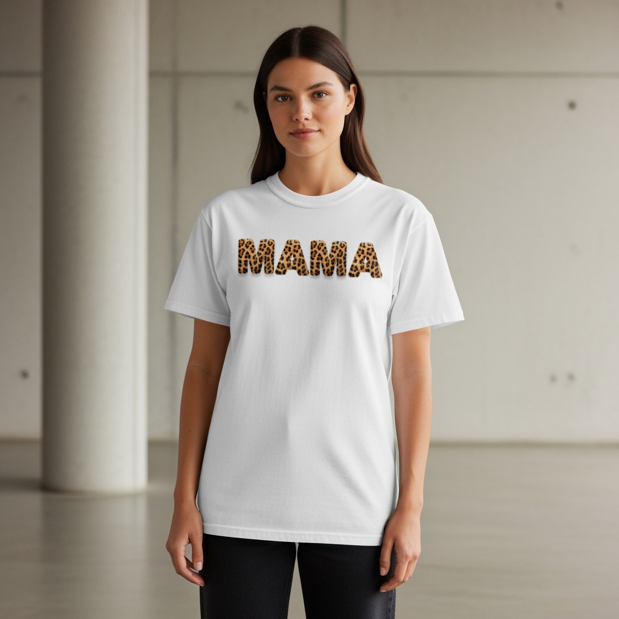 White t-shirt with "MAMA" in leopard print letters.