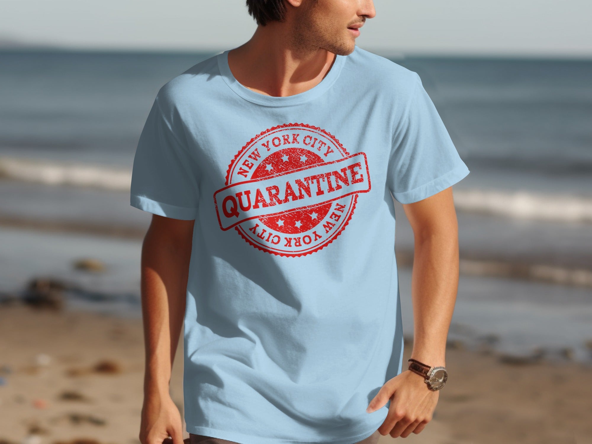 Light blue t-shirt with a red distressed New York City Quarantine stamp graphic.