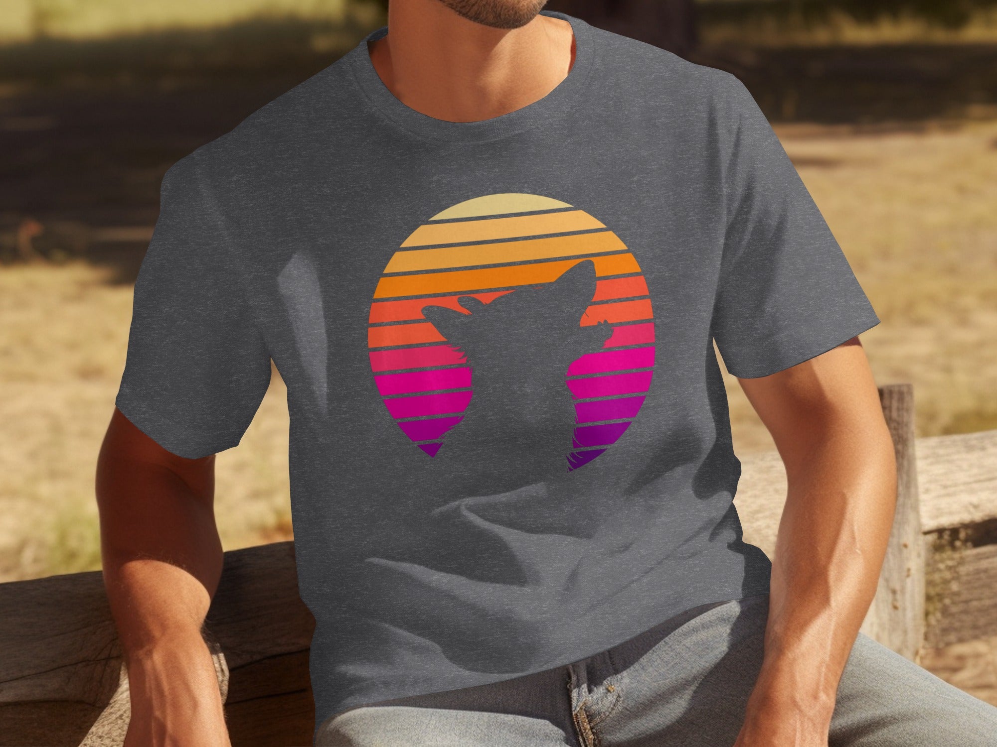 T-shirt with a dog silhouette over a striped sunset circular graphic.