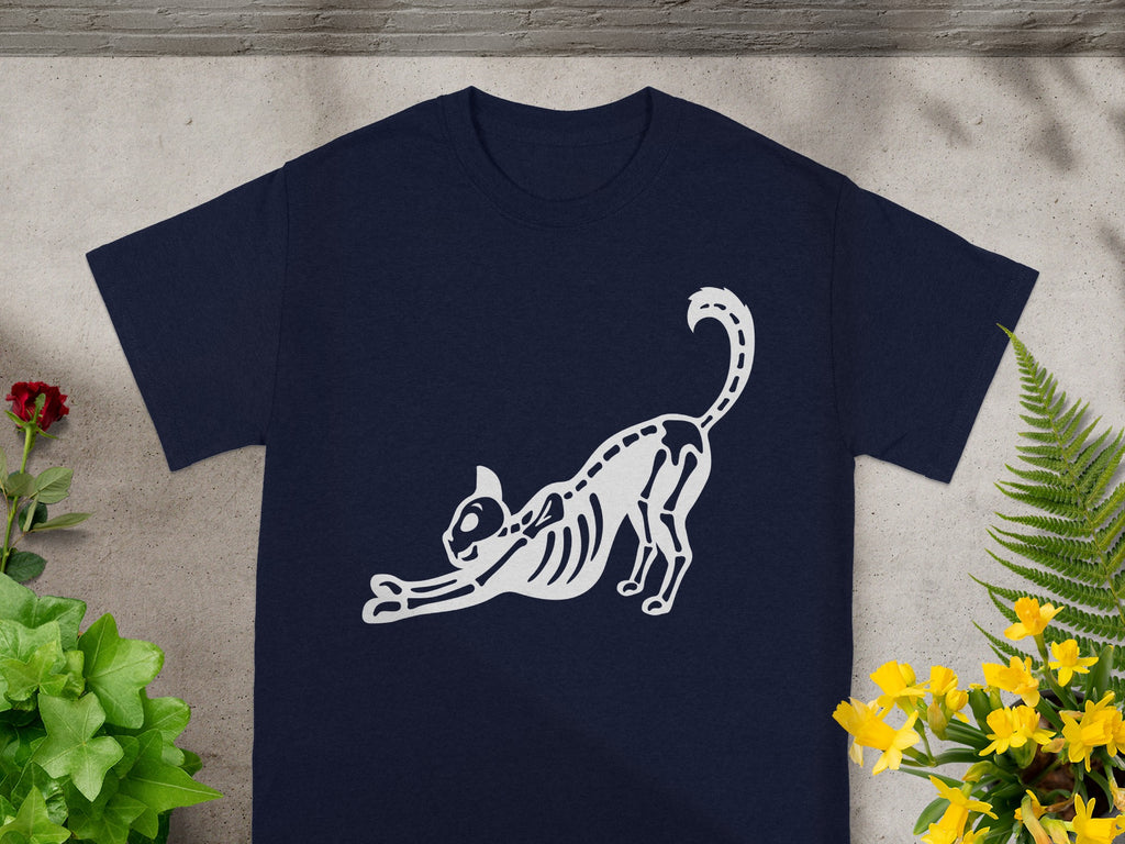 Navy t-shirt with a white skeleton cat stretching graphic.