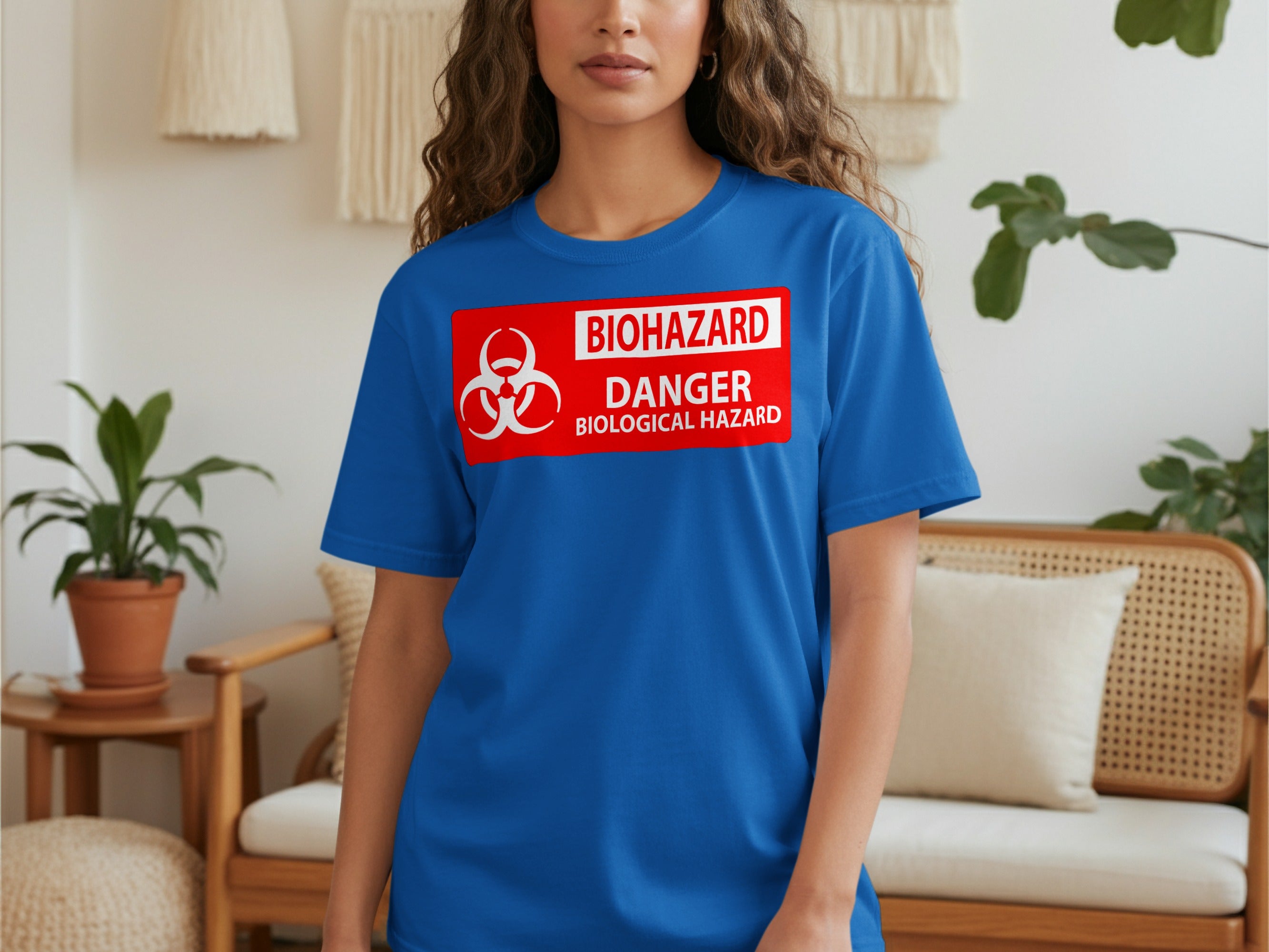Blue t-shirt with a red biohazard danger biological hazard warning sign.