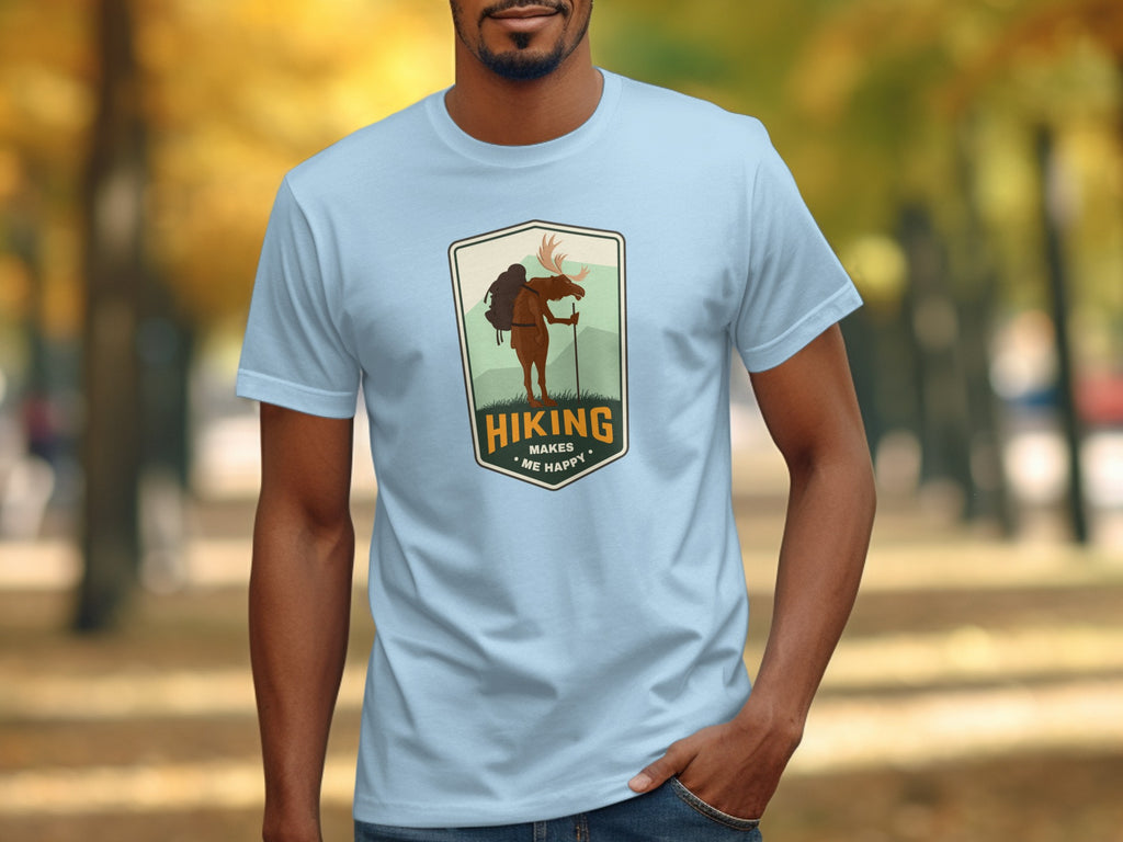 Light blue t-shirt with a moose graphic and text "Hiking Makes Me Happy".